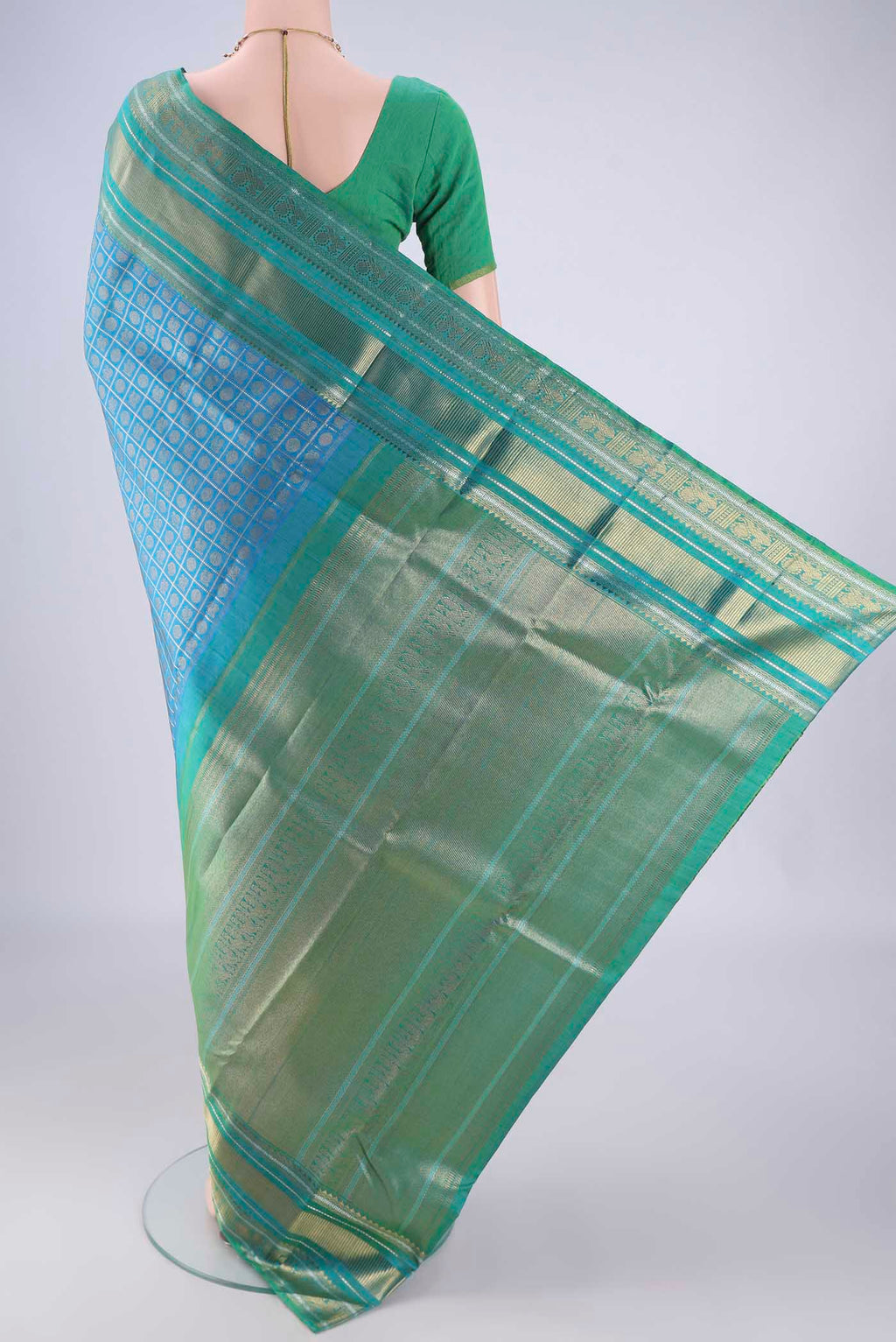 Flat view of Pure Silk Pure Zari Blue Kanjivaram Saree with Checked design on the body and Zari Border. 