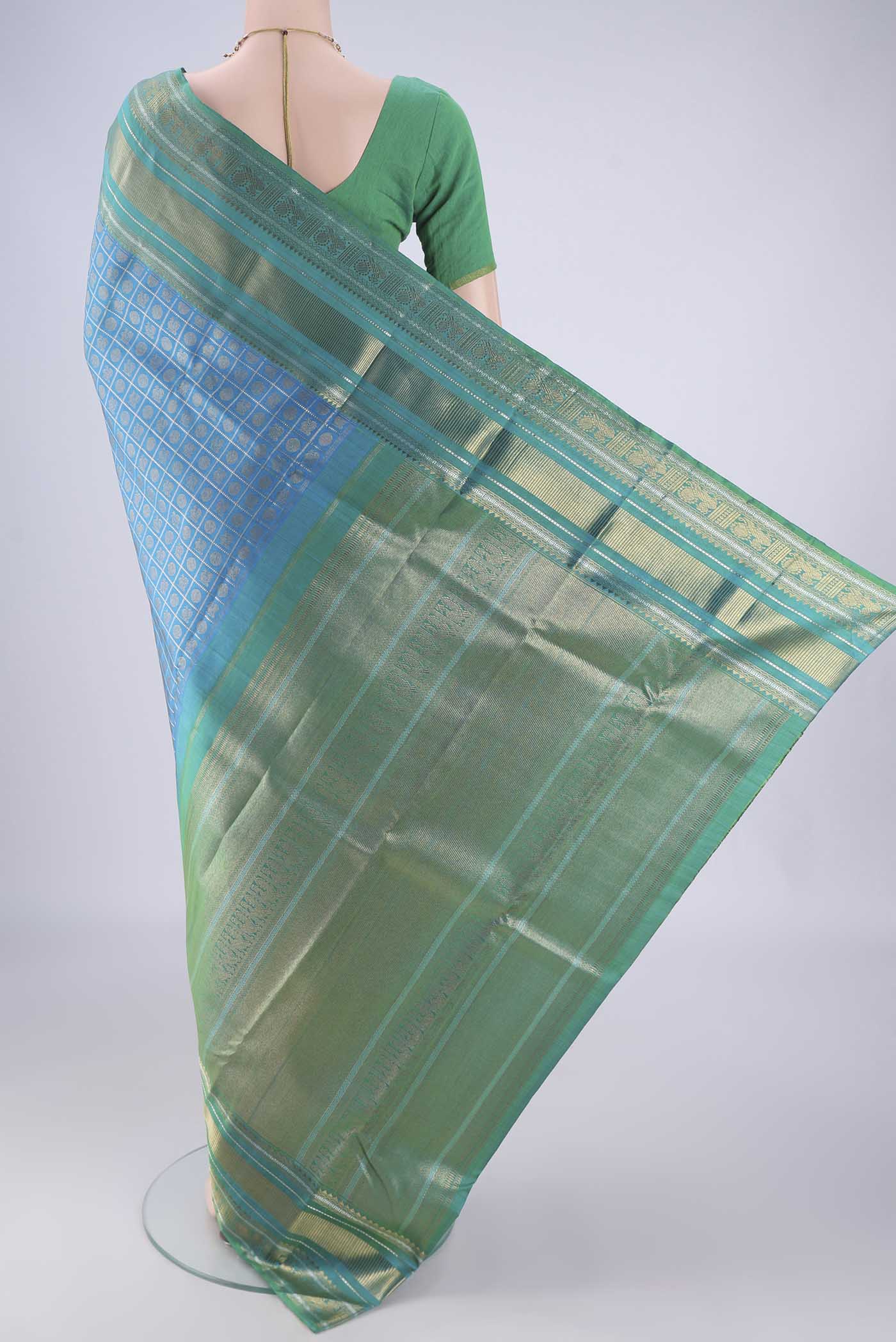 Flat view of Pure Silk Pure Zari Blue Kanjivaram Saree with Checked design on the body and Zari Border. 