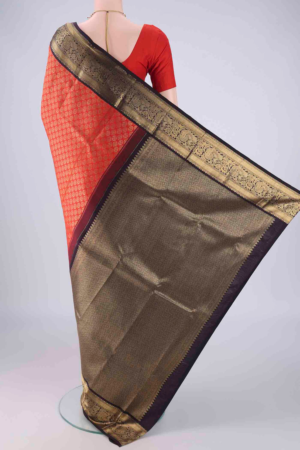 Flat view of Pure Silk Pure Zari Red Kanjivaram Saree with Zari Brocade on the body and Zari Border. 