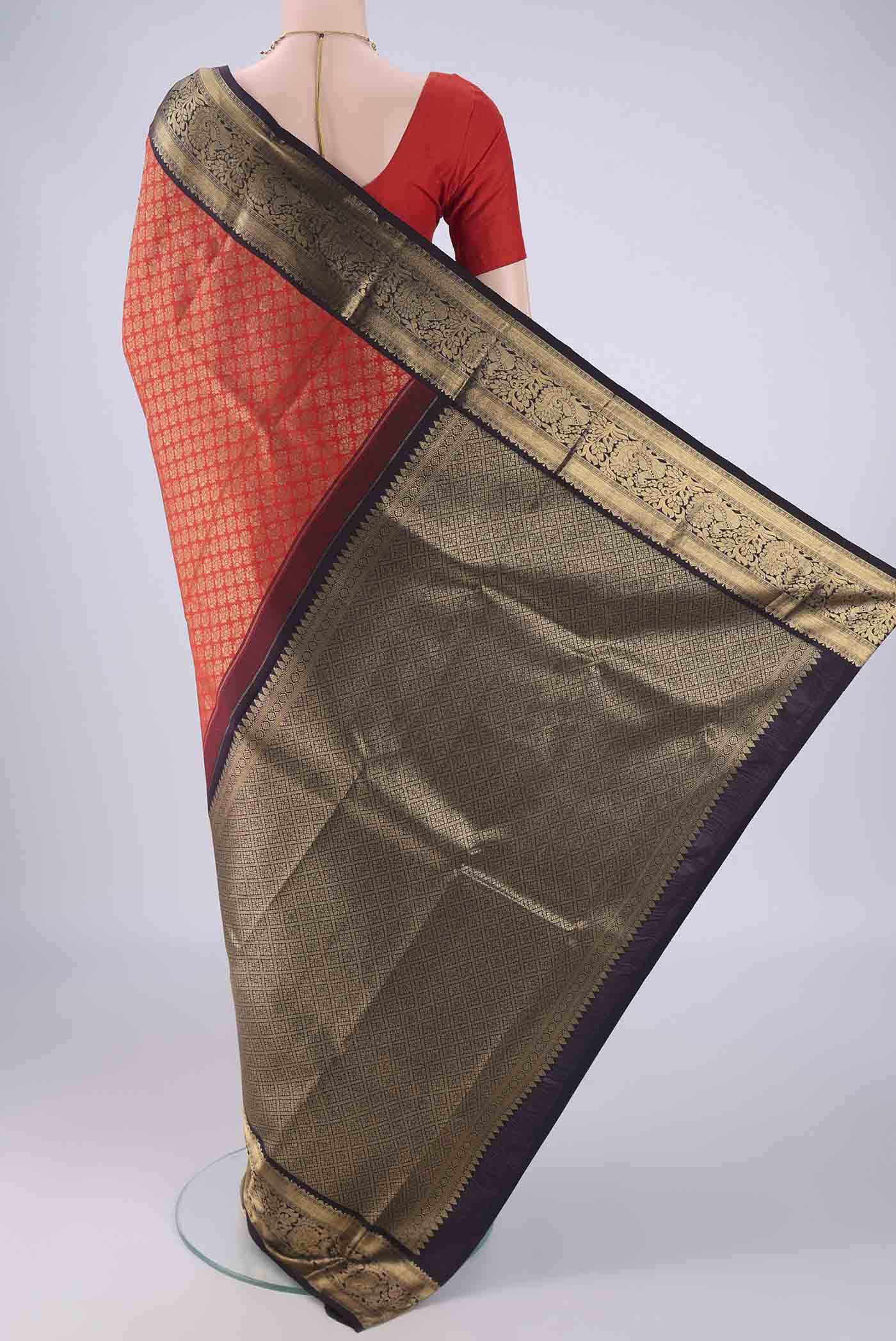 Flat view of Pure Silk Pure Zari Red Kanjivaram Saree with Zari Brocade on the body and Zari Border. 