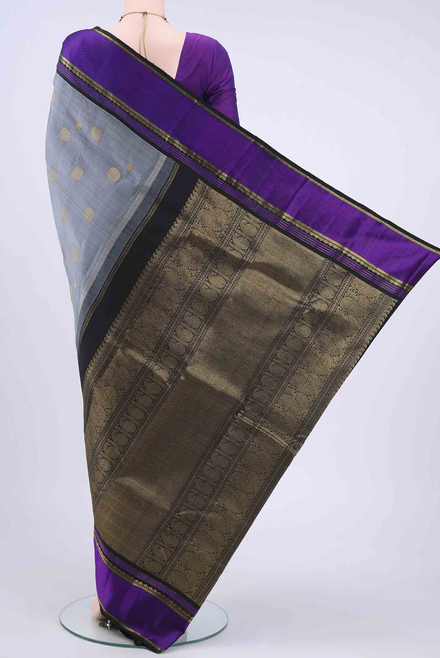 Flat view of Grey Kanchipuram Saree with Jacquard With Zari Butta on the body and Thread Border