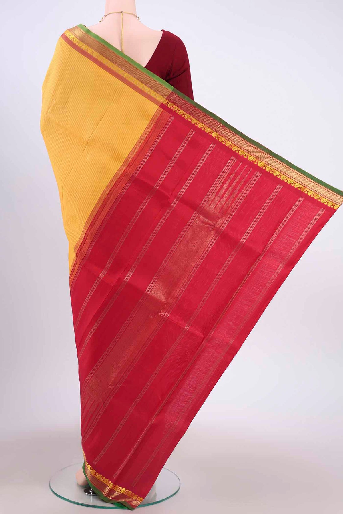 Flat view of Yellow Kanchipuram Silk Saree with Stripes on the body and Zari And Thread Border