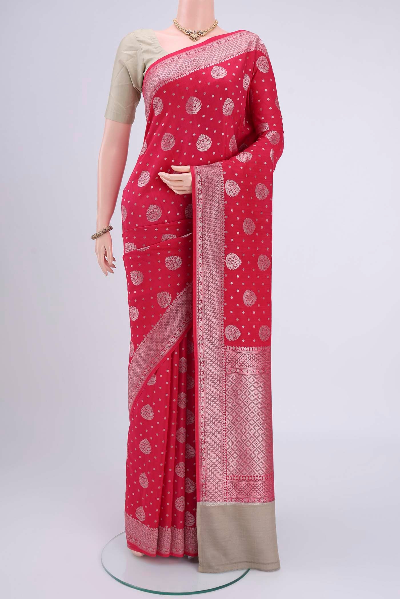 Pink Soft Silk Saree with Checked design on the body and Without Border.  displayed on a mannequin