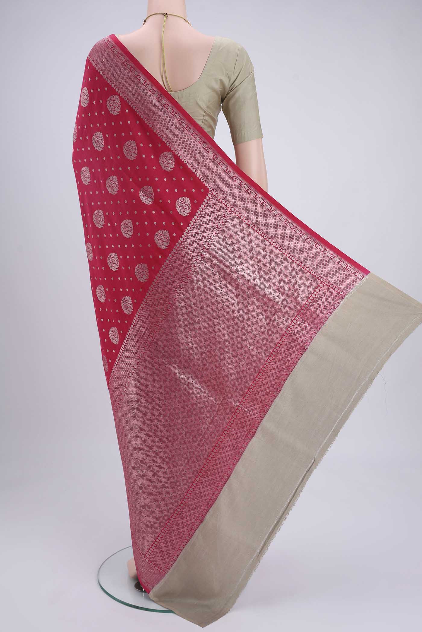 Flat view of Pink Soft Silk Saree with Checked design on the body and Without Border. 