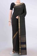 Black Dual Tone Kanchipuram Saree with Checked design on the body and Zari Border displayed on a mannequin
