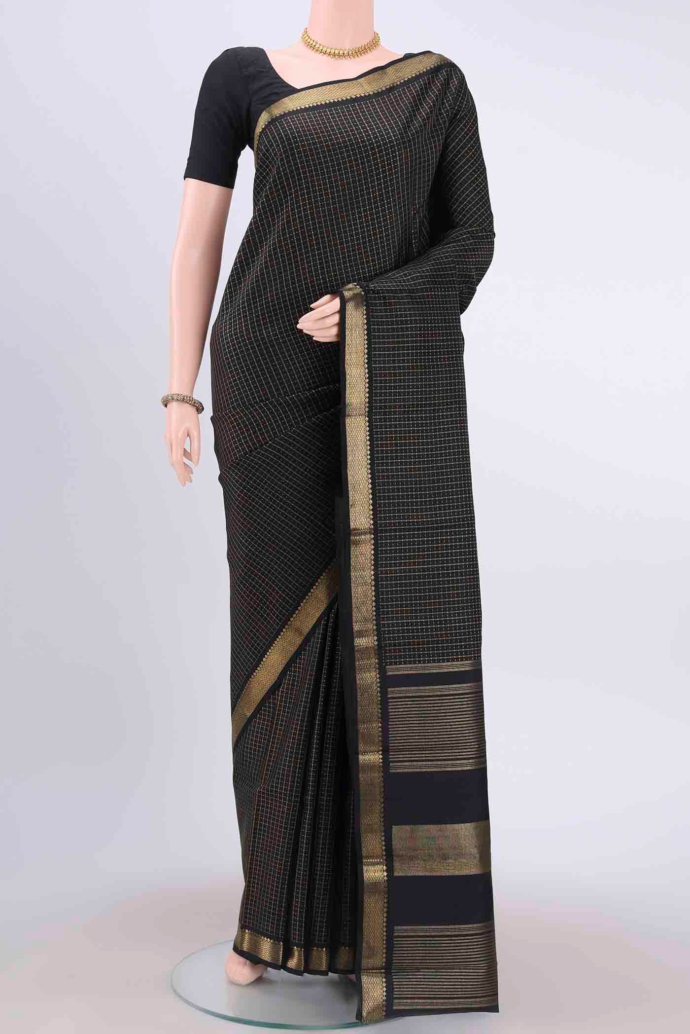 Black Dual Tone Kanchipuram Saree with Checked design on the body and Zari Border displayed on a mannequin