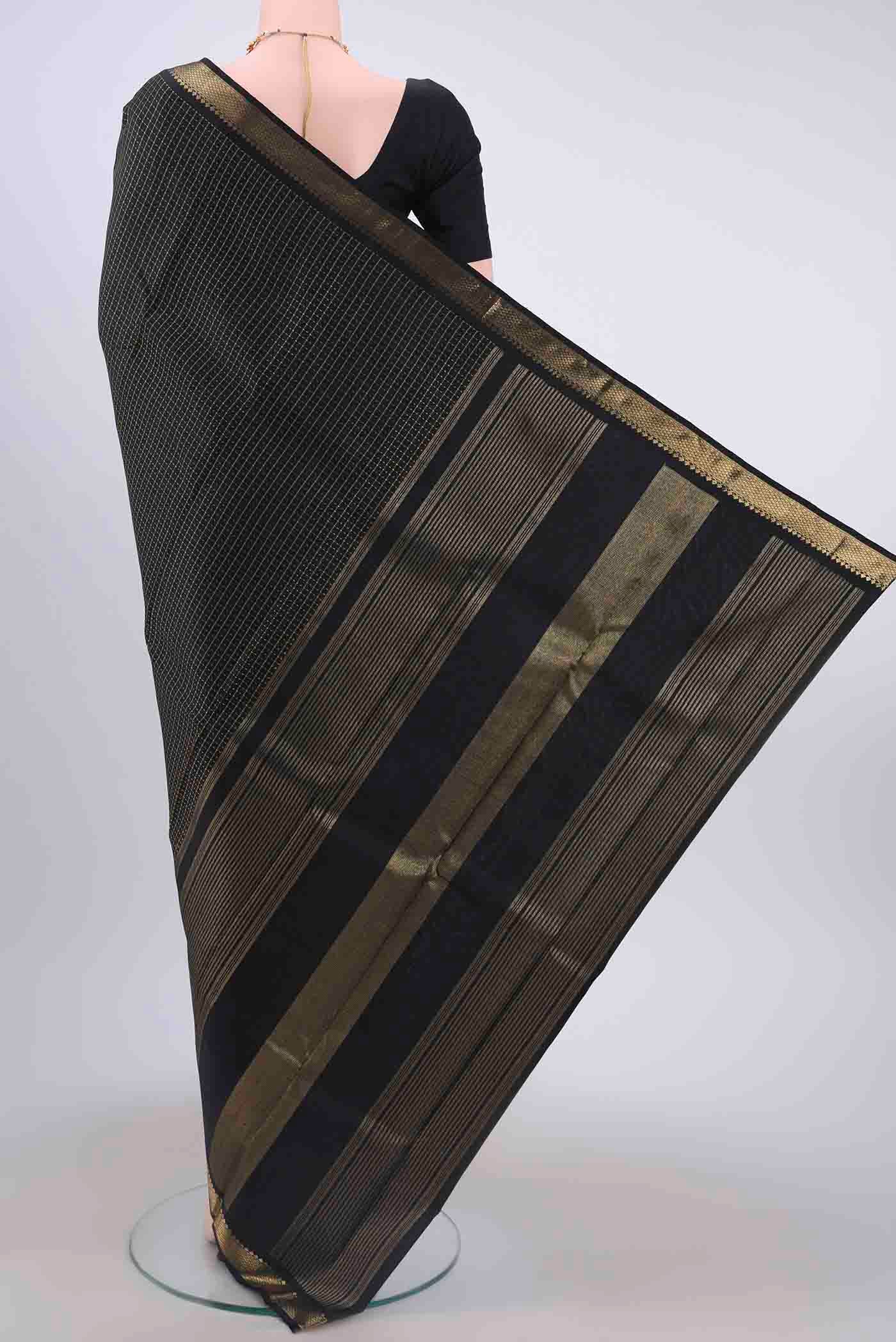 Flat view of Black Dual Tone Kanchipuram Saree with Checked design on the body and Zari Border