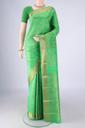 Pure Silk Pure Zari Green Kanjivaram Saree with Zari Brocade on the body and Zari Border.  displayed on a mannequin