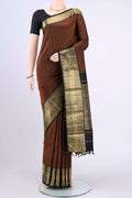 Black Kanchipuram Saree with Zari Butta on the body and Zari Border displayed on a mannequin