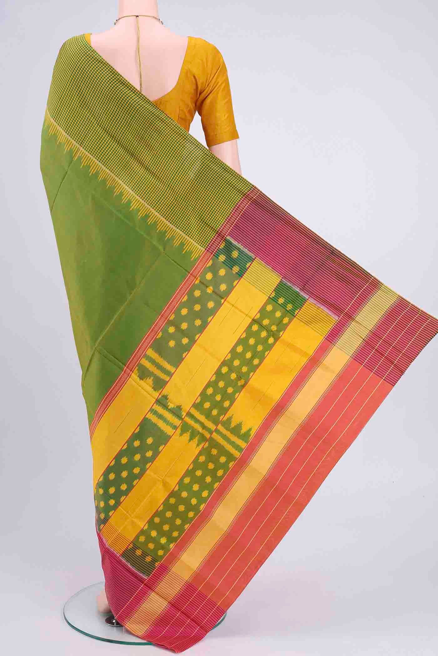 Flat view of Light Green Rajkot Patola Silk Saree with Pure Ikat on the body and Zari Border