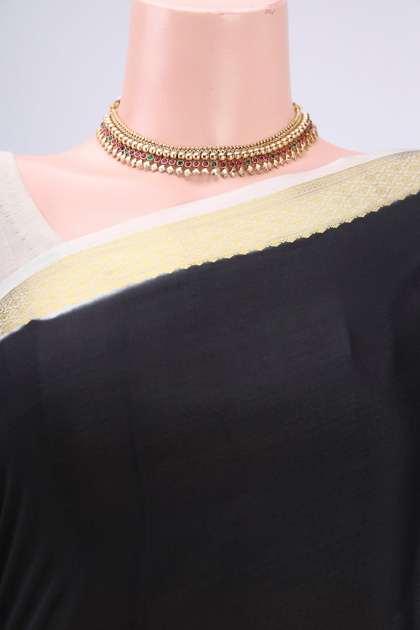 Border image of Black Mysore Crepe Saree with Plain Body and Zari Border. 
