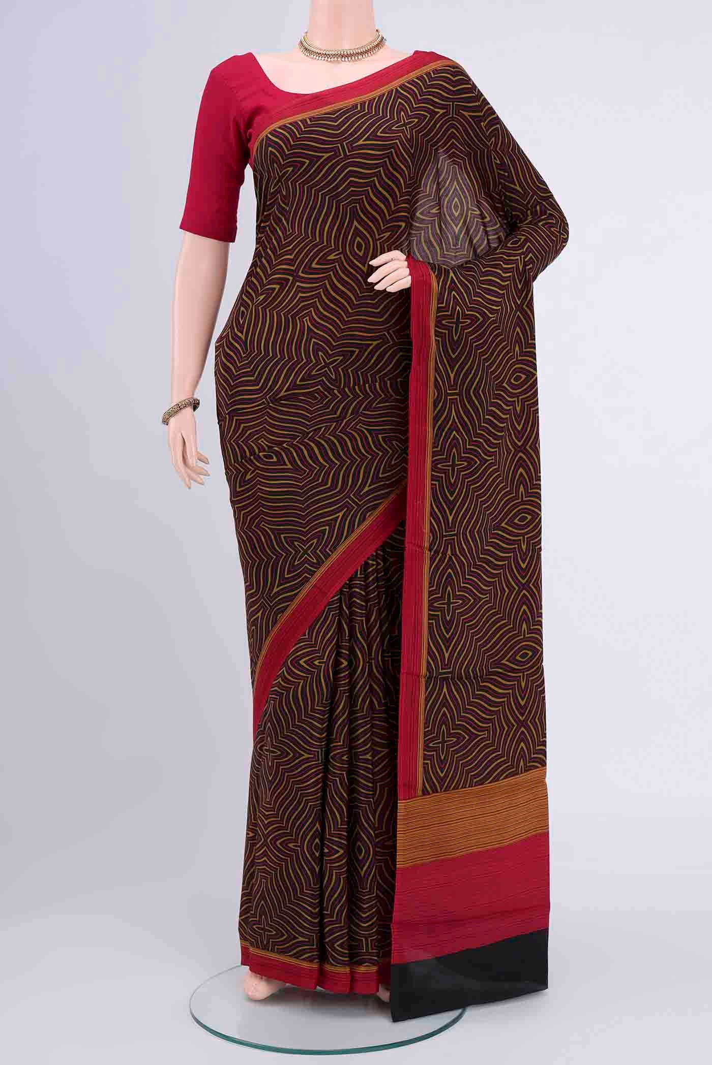 Black Mysore Crepe Saree with Floral Print on the body and Printed Border displayed on a mannequin