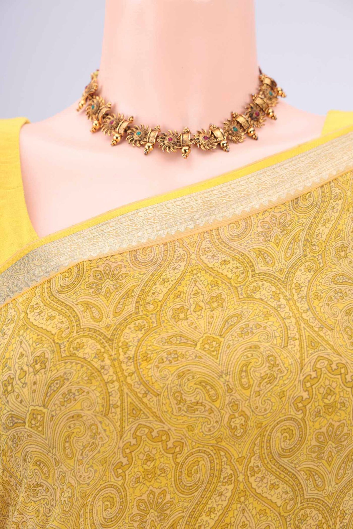 Border image of Light Green Mysore Chiffon Saree with Floral Print on the body and Zari Border. 