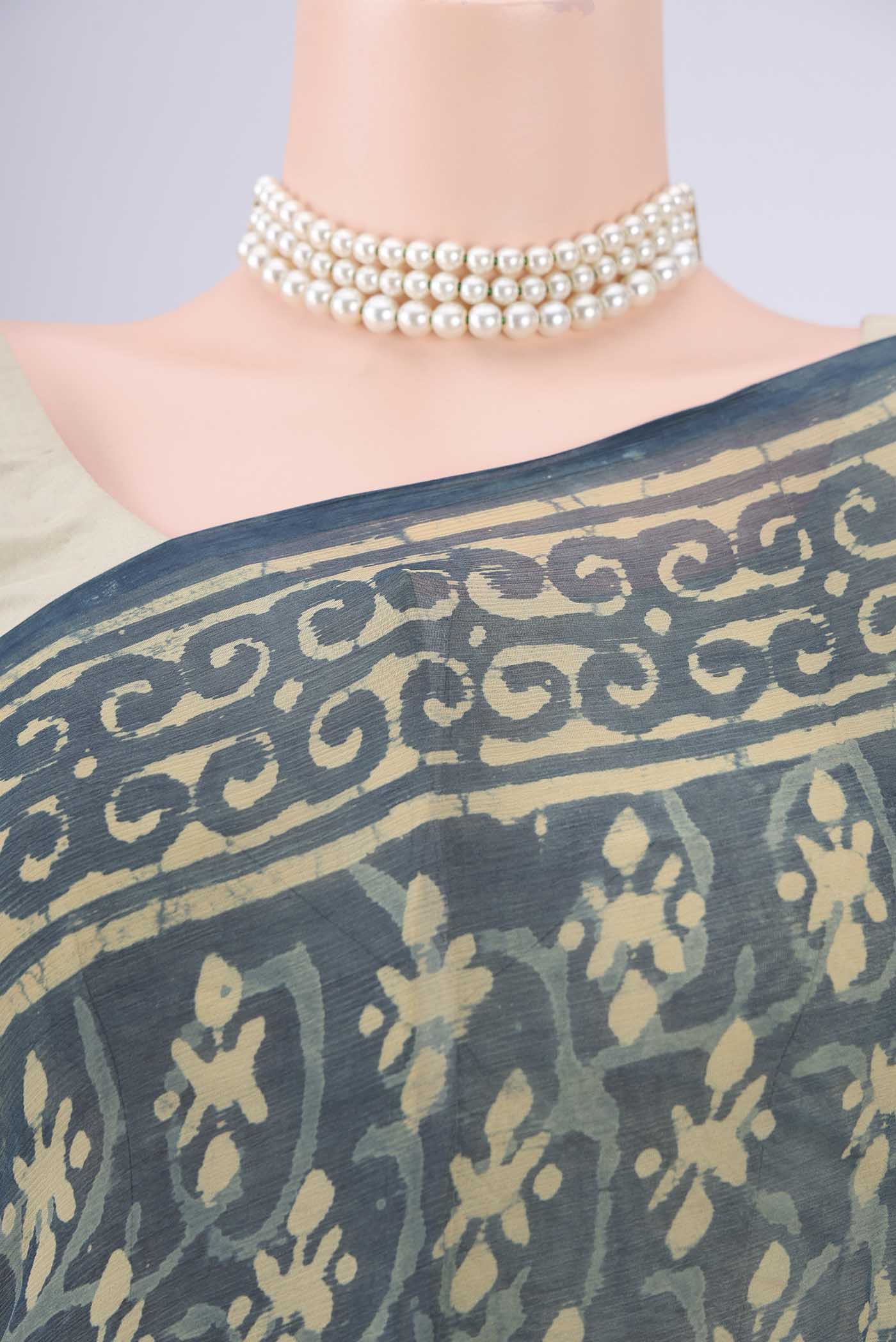 Border image of Indigo Mysore Chiffon Saree with Batik Print on the body and Printed Border. 