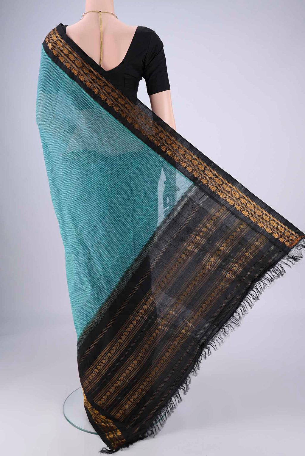 Flat view of Blue Gadwal Silk Cotton Saree with Checked design on the body and Silk Border. 