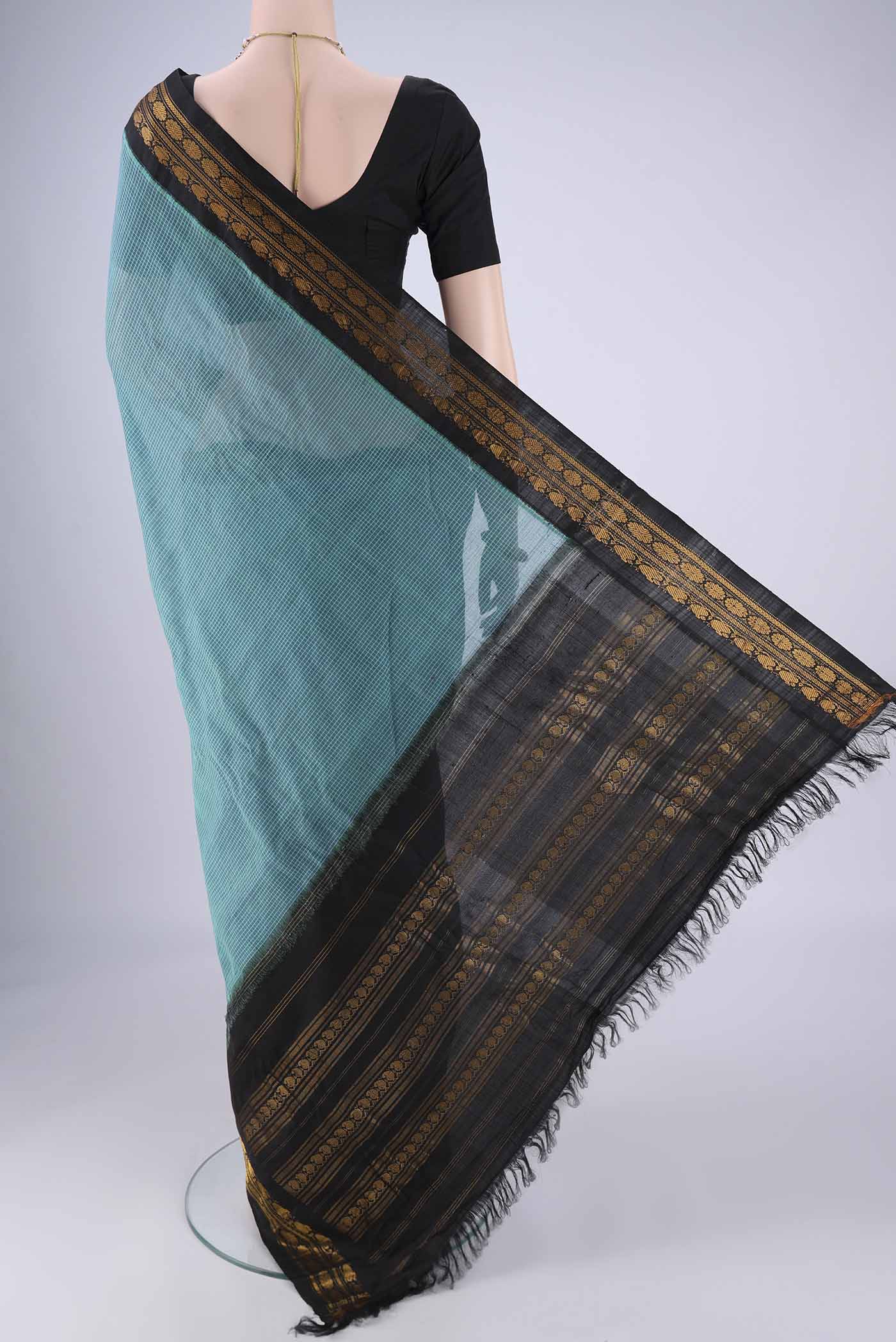 Flat view of Blue Gadwal Silk Cotton Saree with Checked design on the body and Silk Border. 