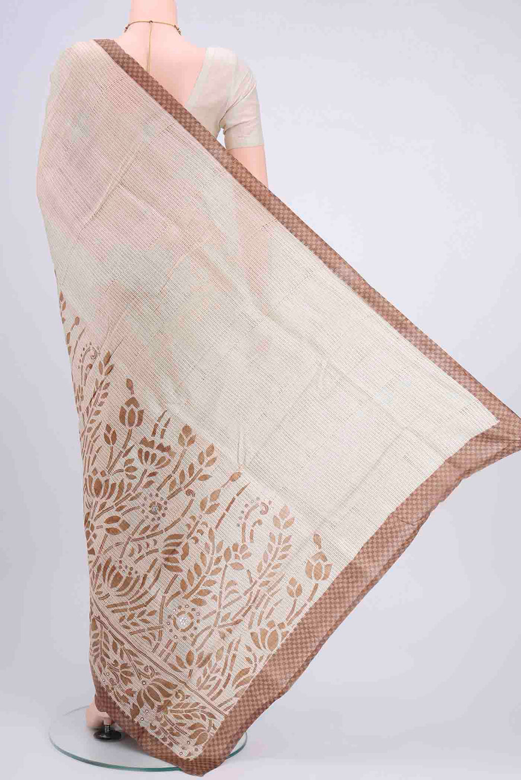 Flat view of Off White Printed Silk Saree with Embroidery on the body and Zari Border
