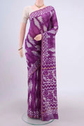 Magenta Chanderi Silk Cotton Saree with Printed design on the body and Zari Border.  displayed on a mannequin