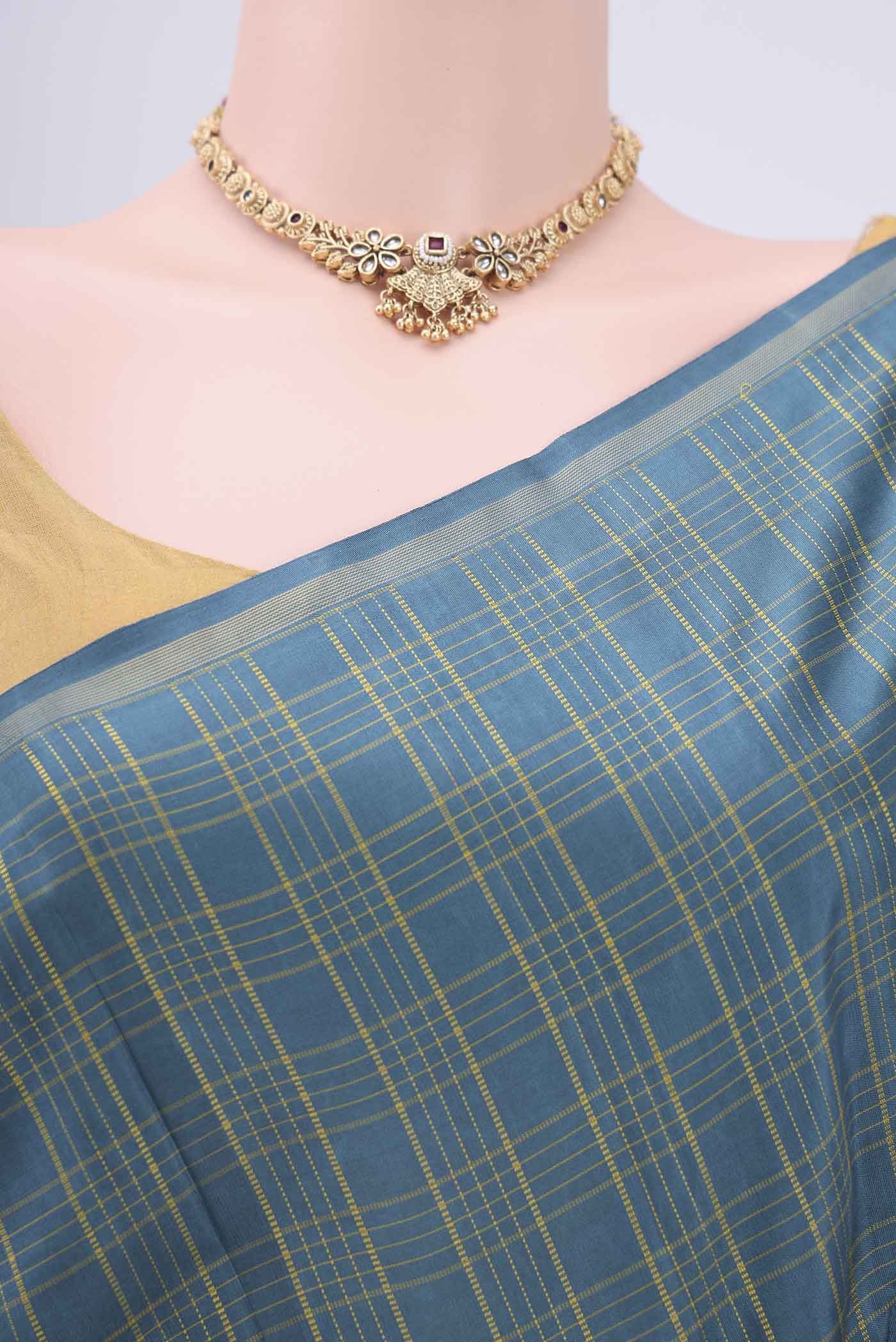 Border image of Pure Silk Pure Zari Light Blue Kanchipuram Saree with Checked design on the body and Zari Border