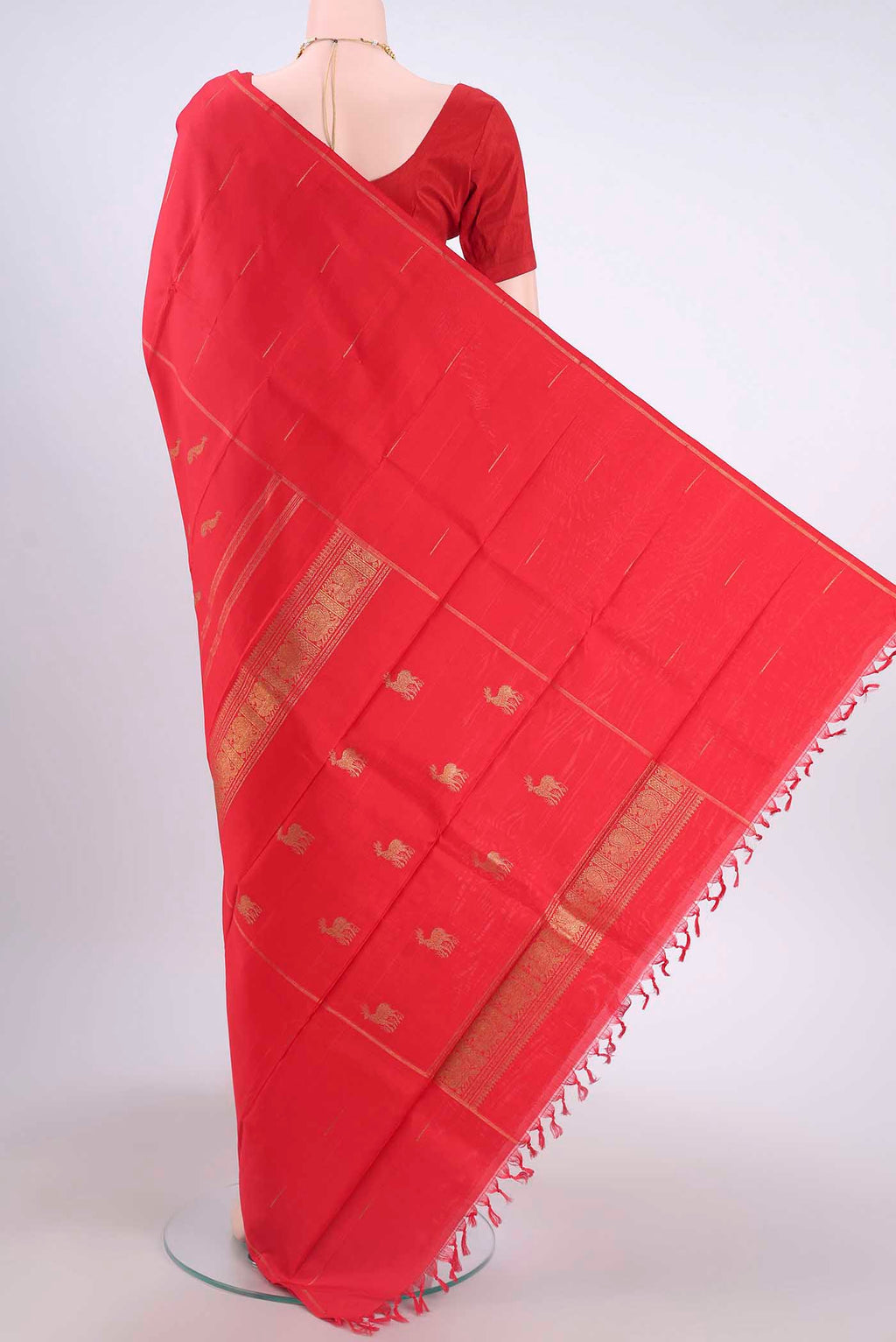 Flat view of Red Kanchipuram Silk Saree with Zari Butta on the body and Zari Border