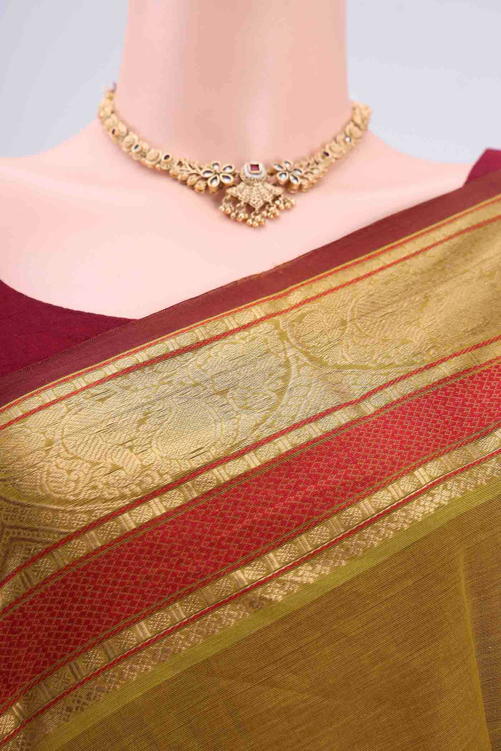 Border image of Mehandi Green Kanchi Cotton Saree with Plain Body and Zari Border. 