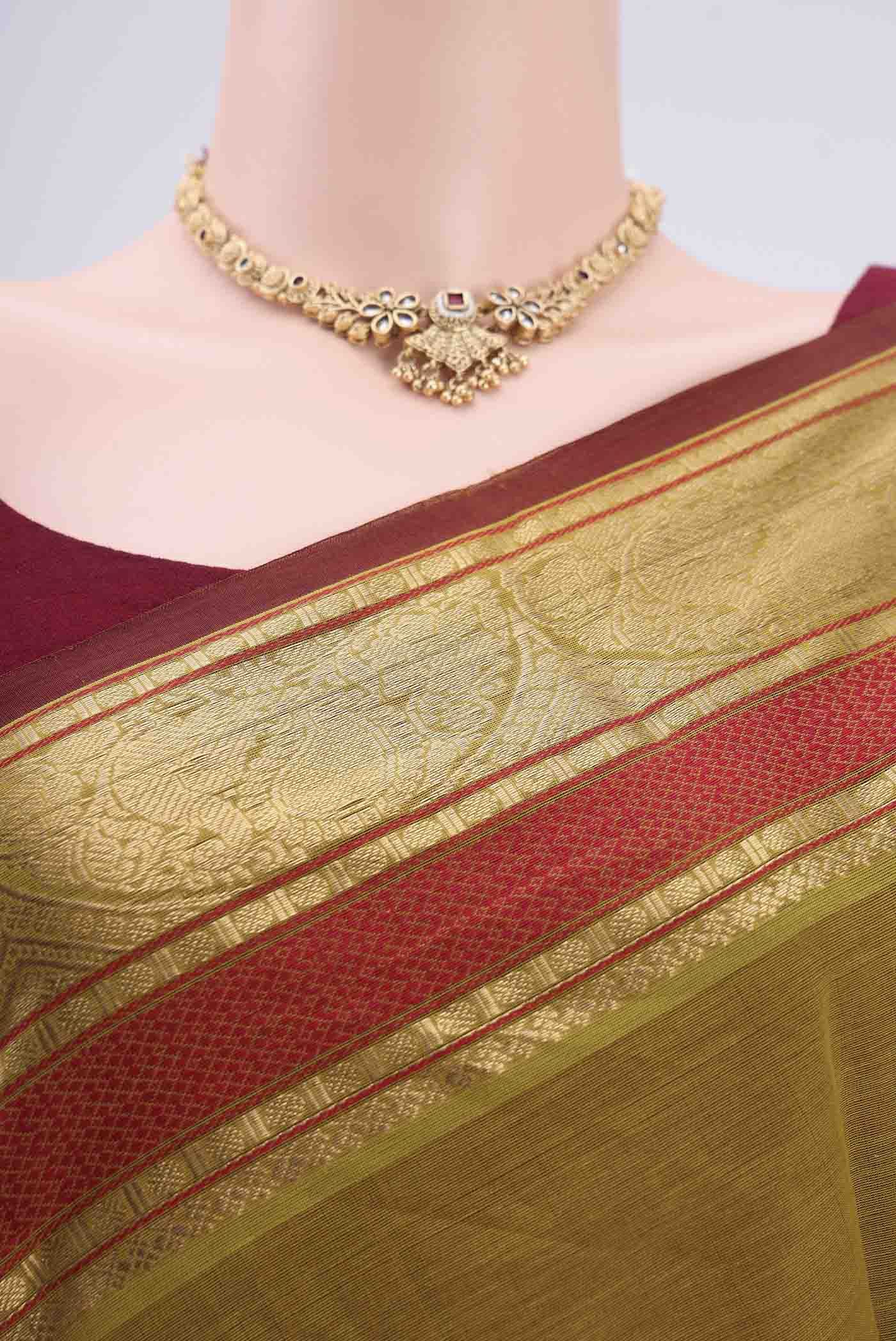 Border image of Mehandi Green Kanchi Cotton Saree with Plain Body and Zari Border. 