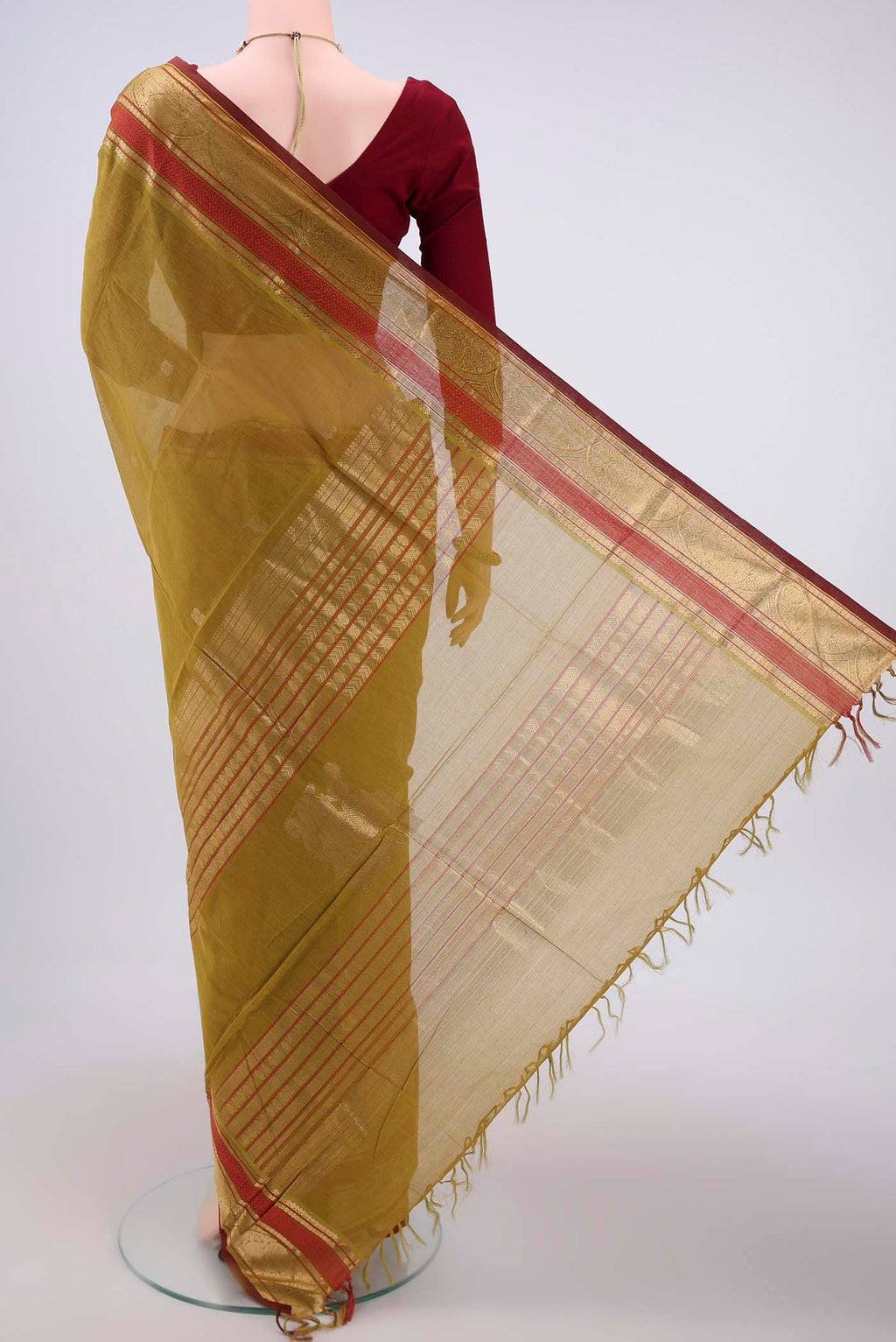 Flat view of Mehandi Green Kanchi Cotton Saree with Plain Body and Zari Border. 