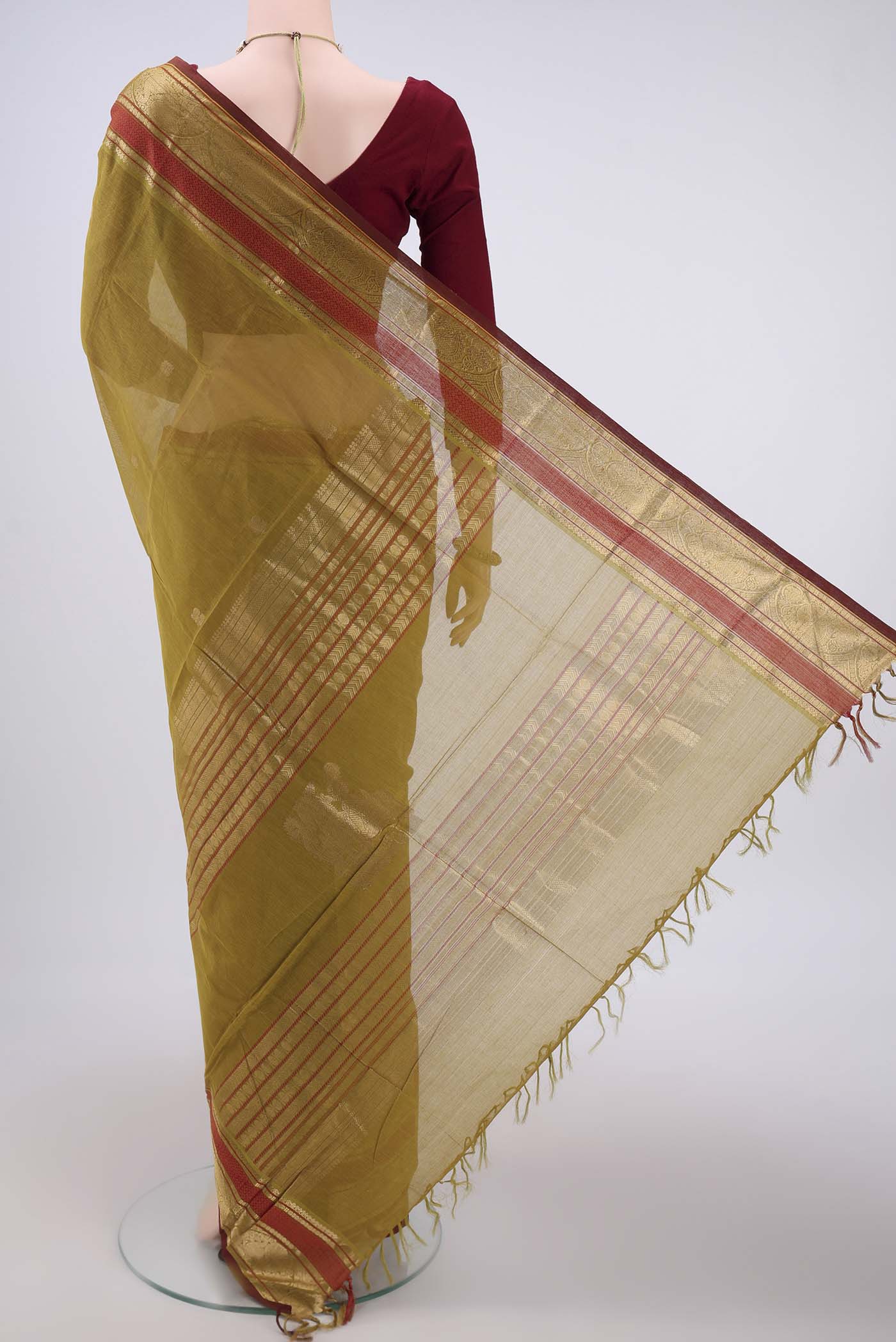Flat view of Mehandi Green Kanchi Cotton Saree with Plain Body and Zari Border. 