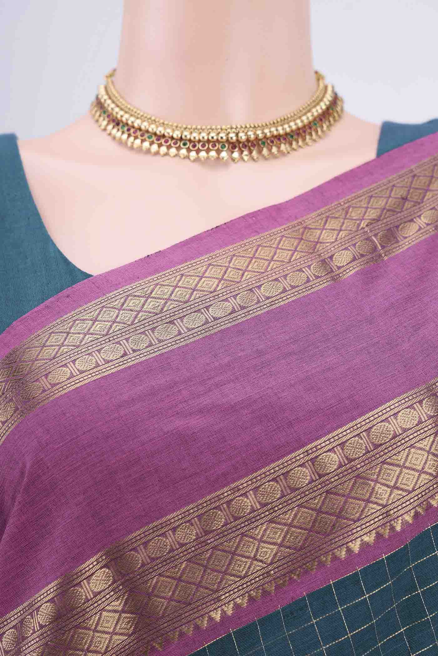 Border image of Green Kanchi Cotton Saree with Checked design on the body and Zari Border. 