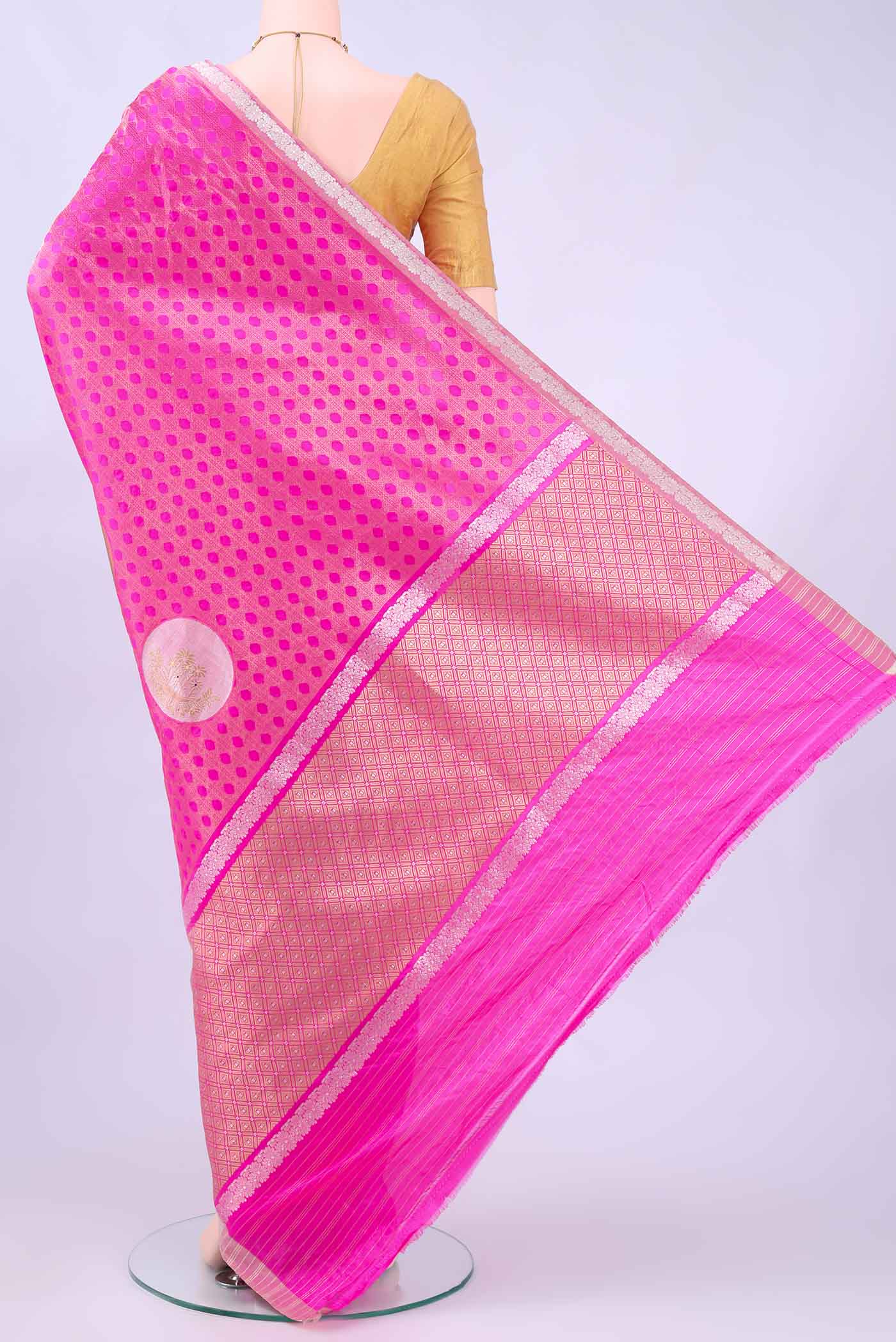 Flat view of Rani Pink Banarasi Kora Silk Saree with Zari Brocade on the body and Zari Border