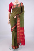 Green Gadwal cotton Saree with Checked design on the body and Silk Border.  displayed on a mannequin