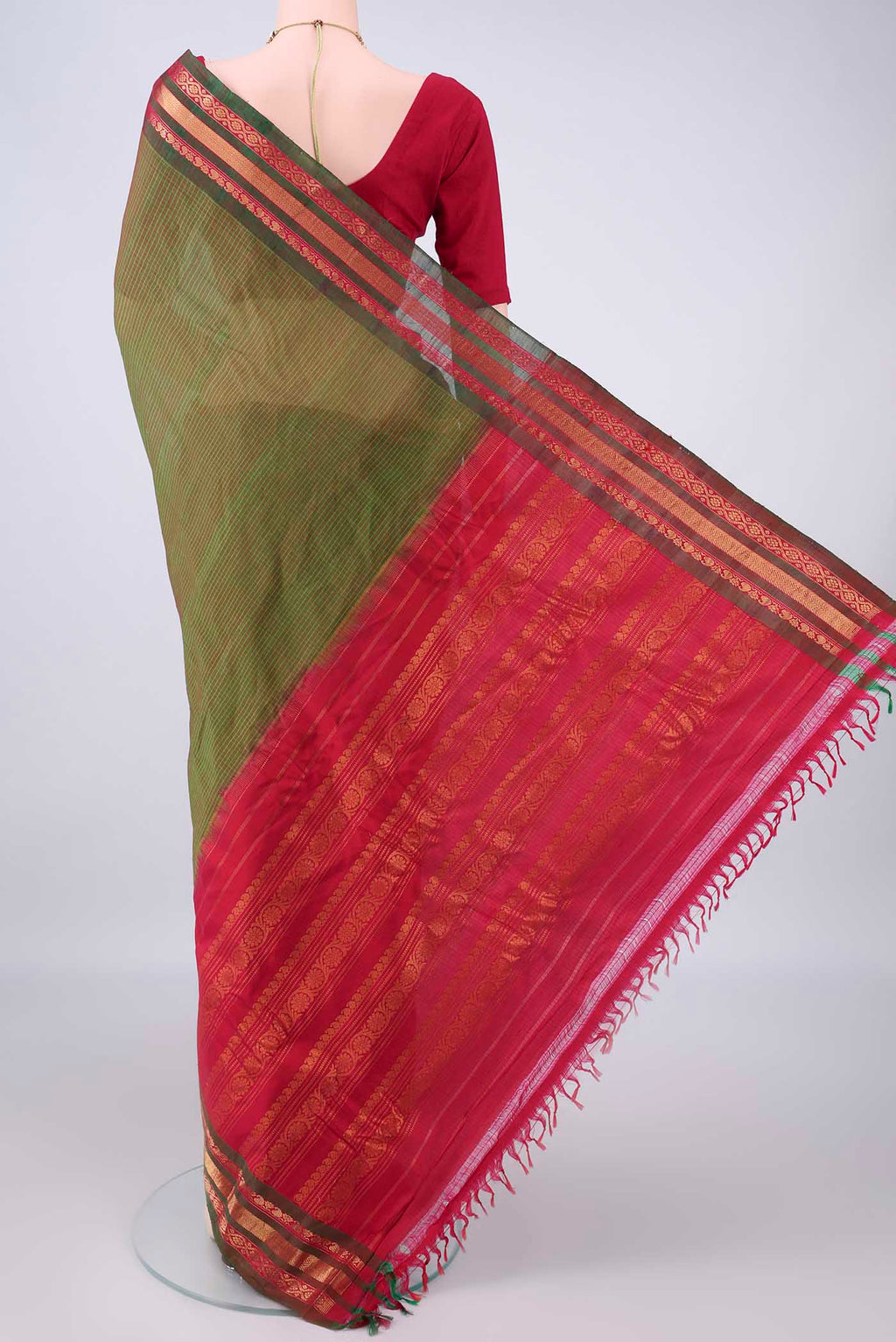 Flat view of Green Gadwal cotton Saree with Checked design on the body and Silk Border. 