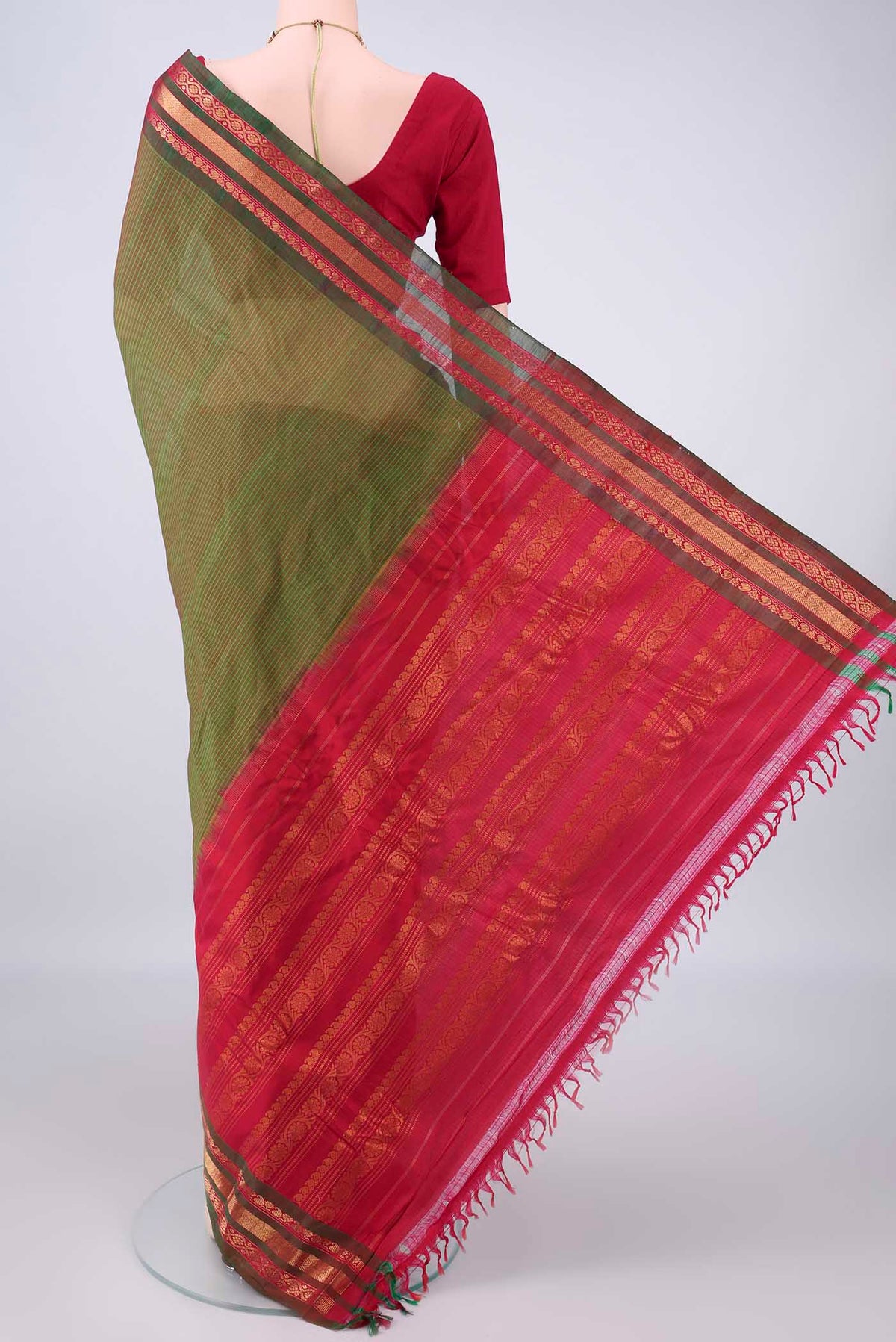 Flat view of Green Gadwal cotton Saree with Checked design on the body and Silk Border. 