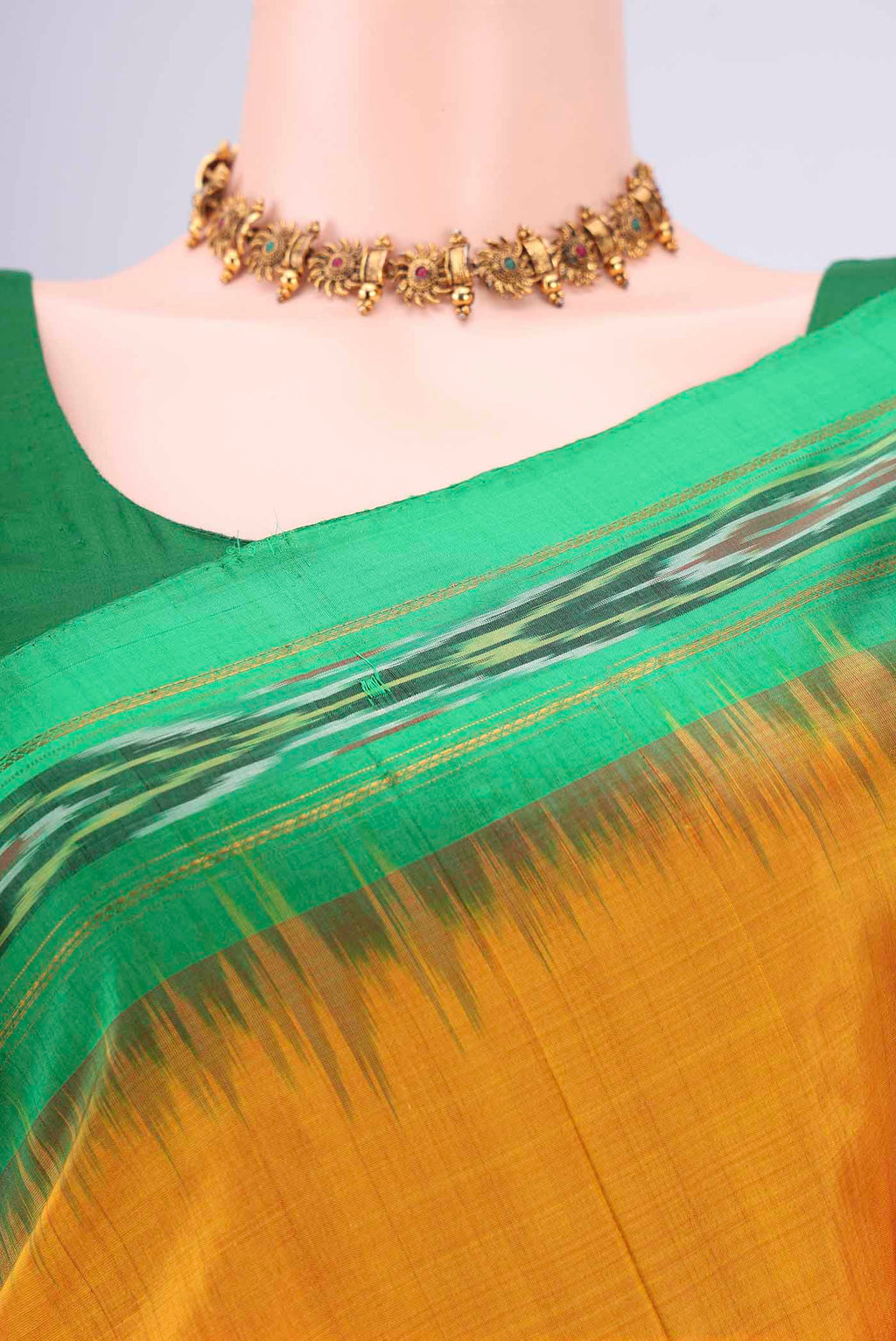 Border image of Yellow Pochampally Silk Saree with Plain Body and Ikat Border. 