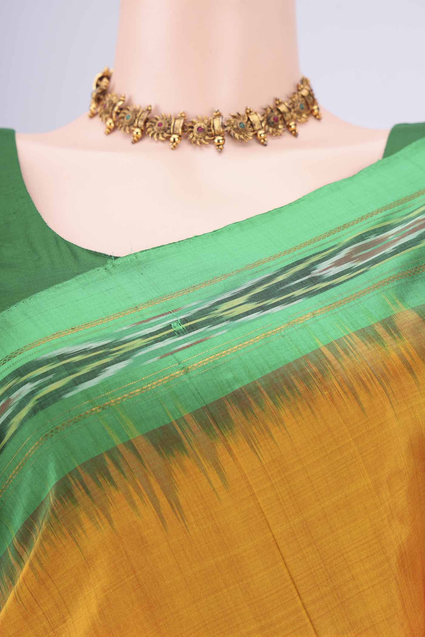 Border image of Yellow Pochampally Silk Saree with Plain Body and Ikat Border. 