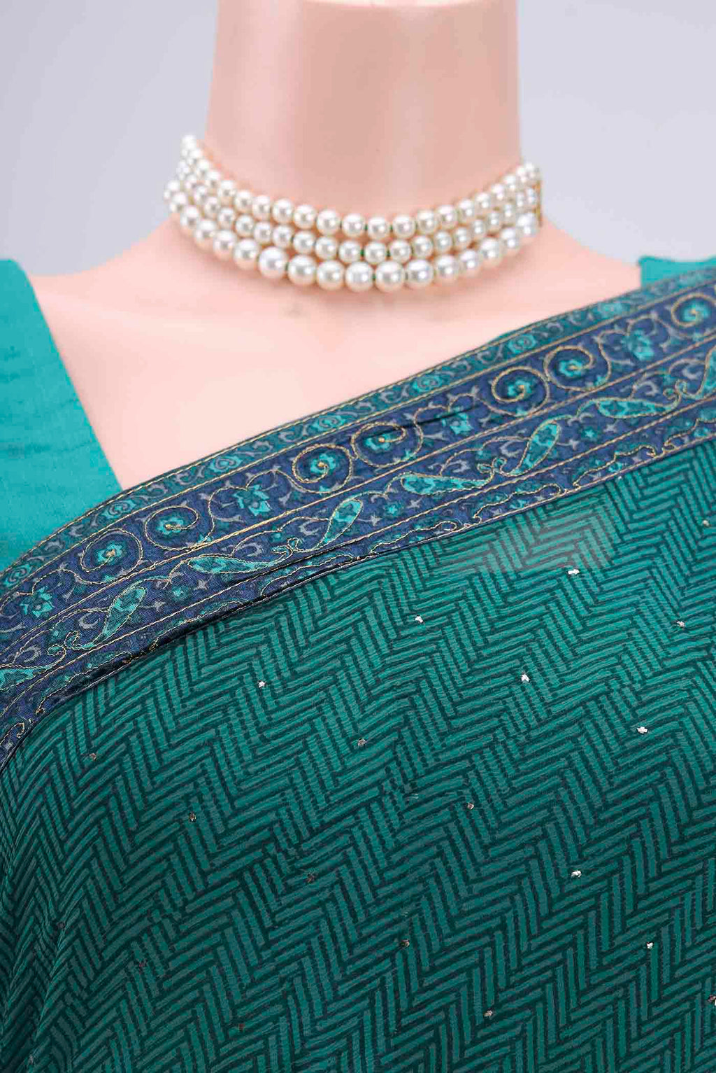 Border image of Green Mysore Chiffon Saree with Embroidery on the body and Embroidery Border. 