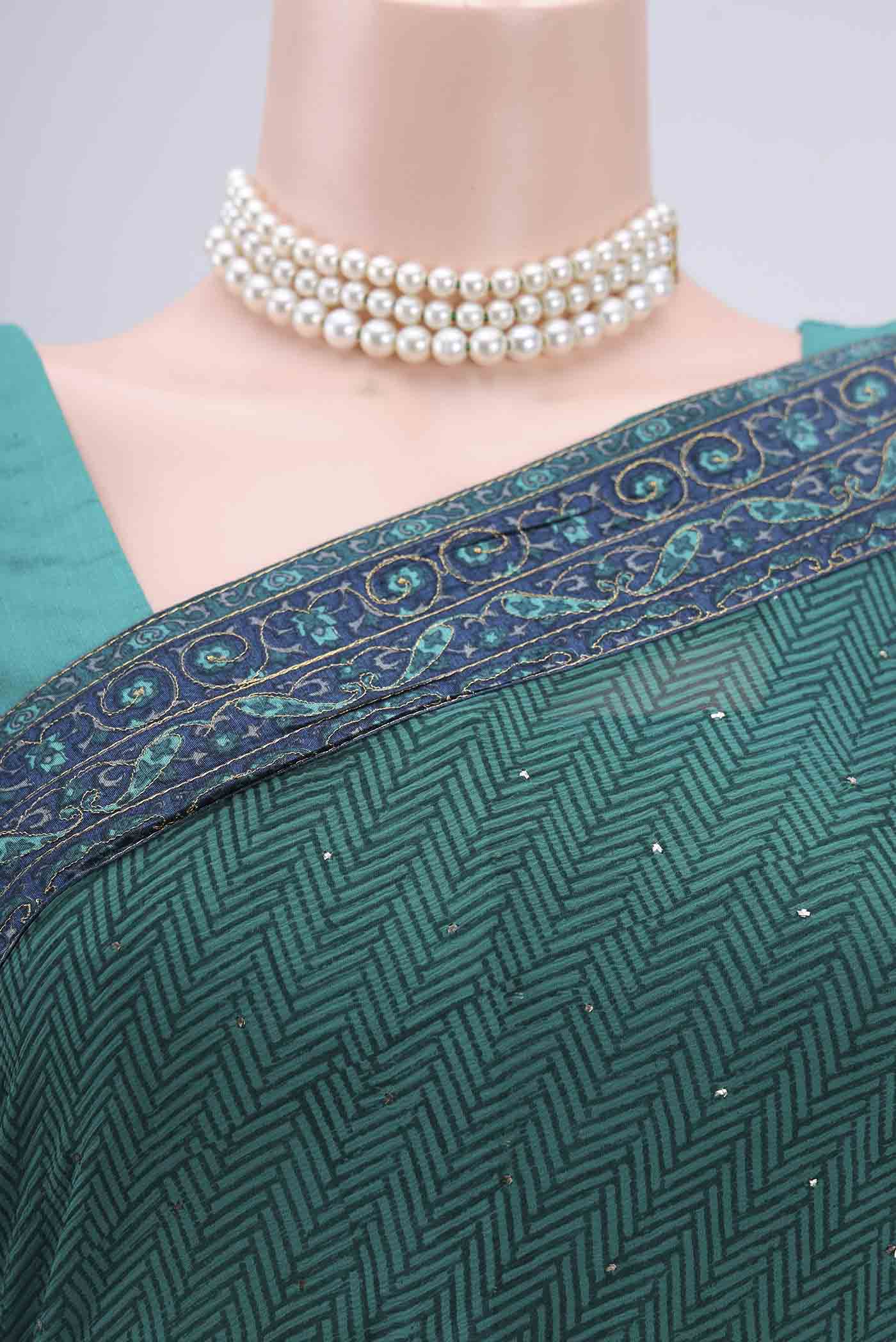 Border image of Green Mysore Chiffon Saree with Embroidery on the body and Embroidery Border. 
