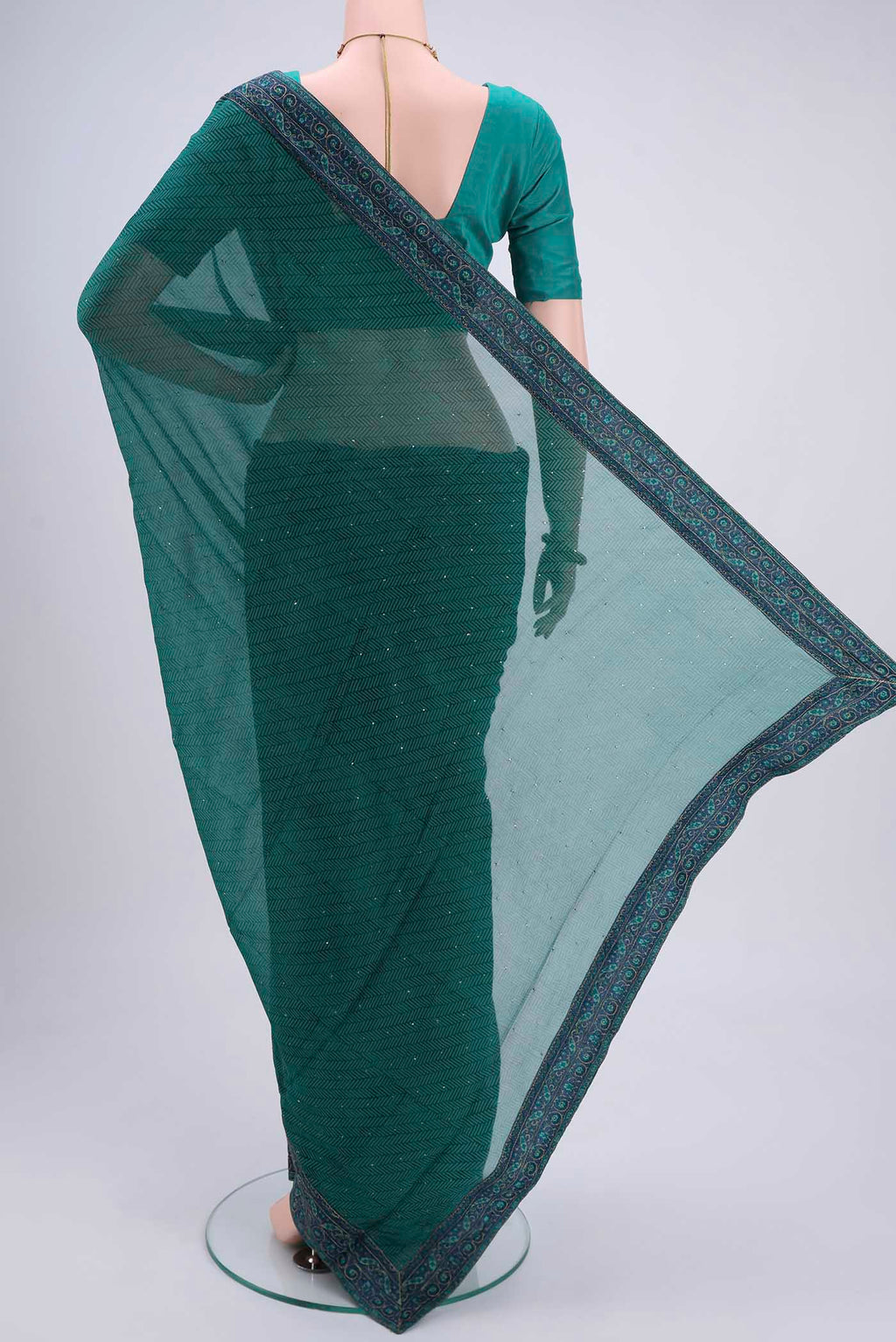 Flat view of Green Mysore Chiffon Saree with Embroidery on the body and Embroidery Border. 