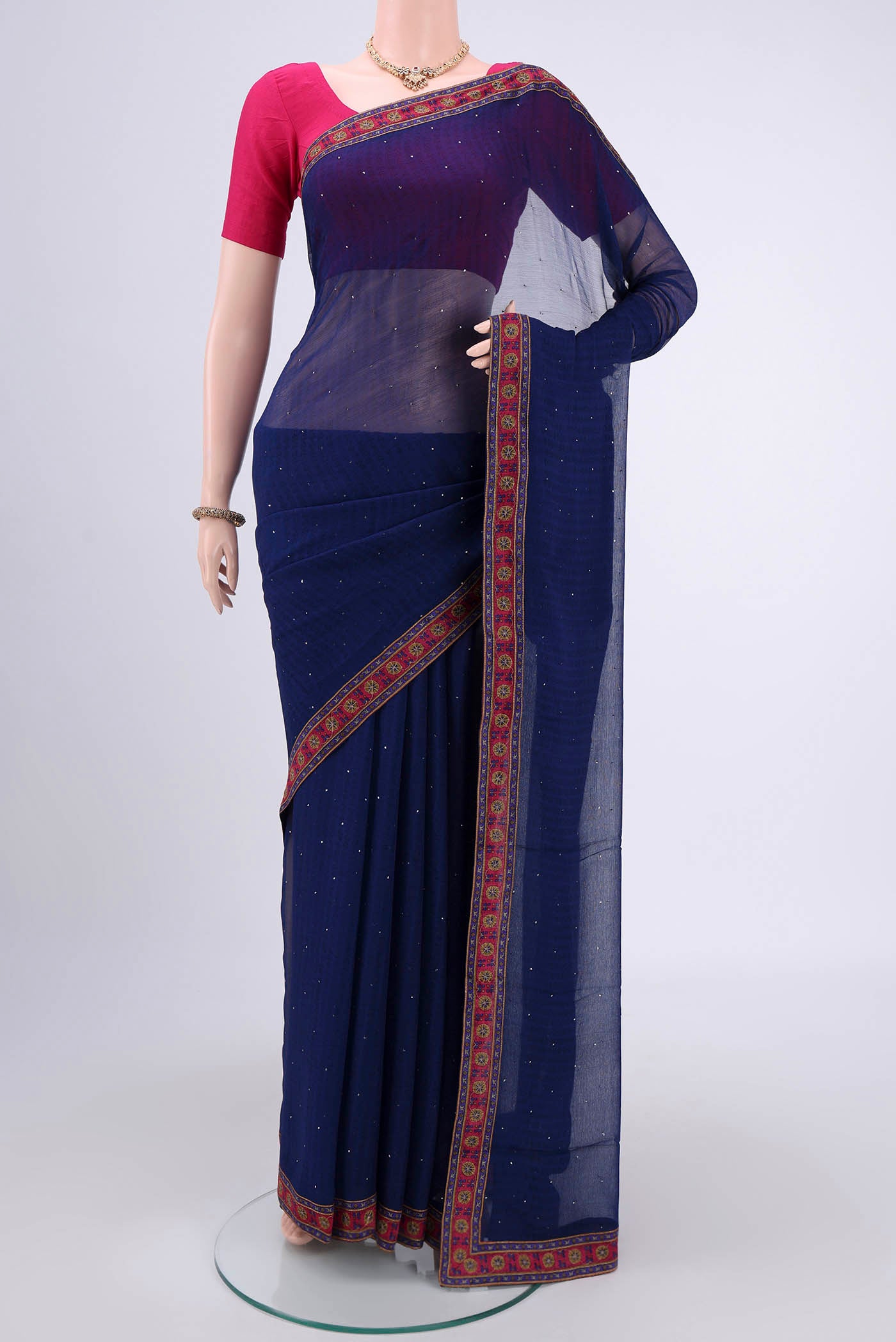 Dark Blue Mysore Chiffon Saree with Fancy on the body and Attached Border.  displayed on a mannequin
