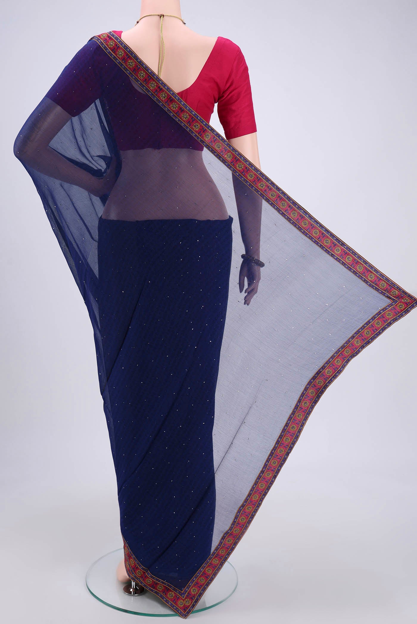 Flat view of Dark Blue Mysore Chiffon Saree with Fancy on the body and Attached Border. 