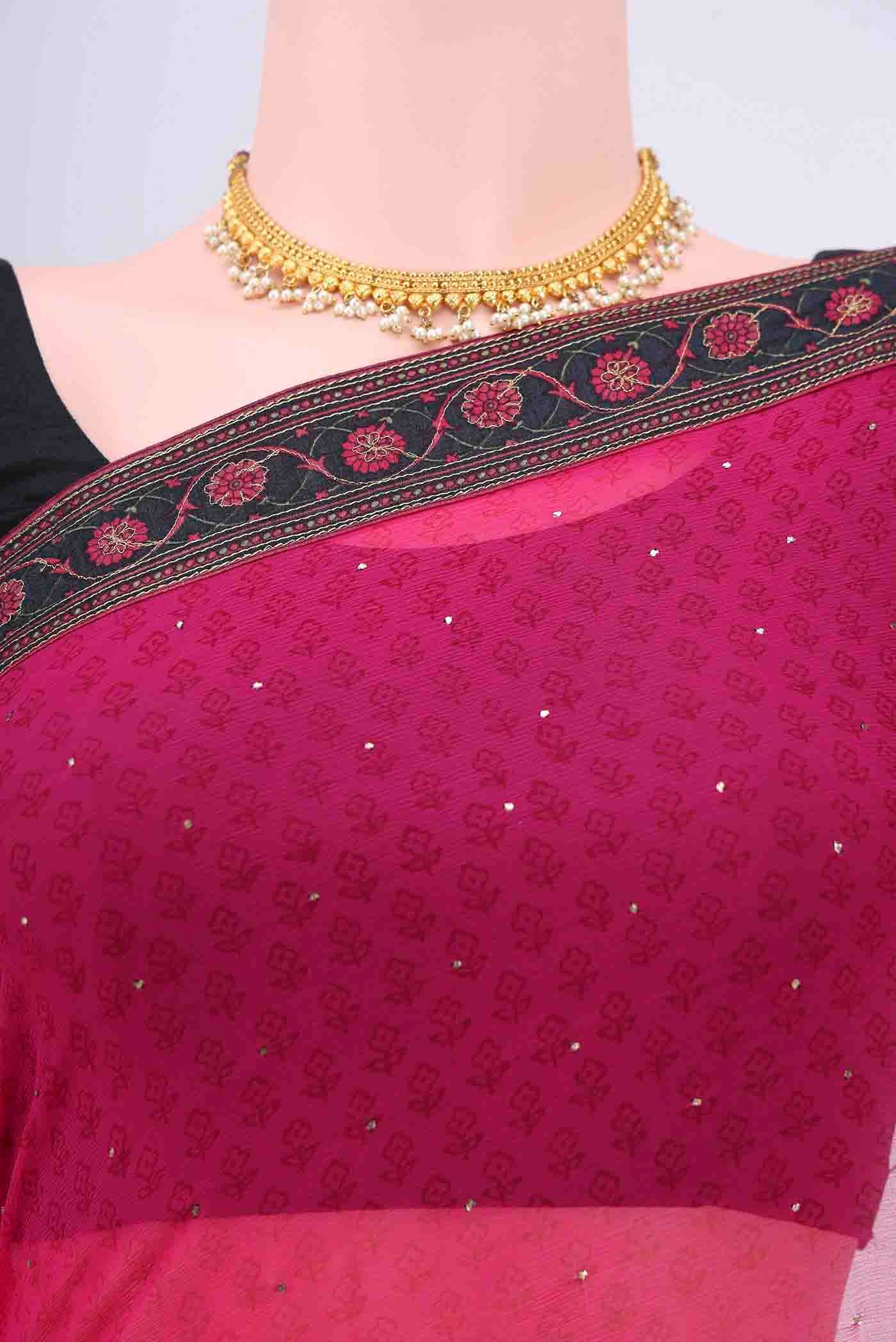Border image of Dark Pink Chiffon Saree with Printed design on the body and Attached Border