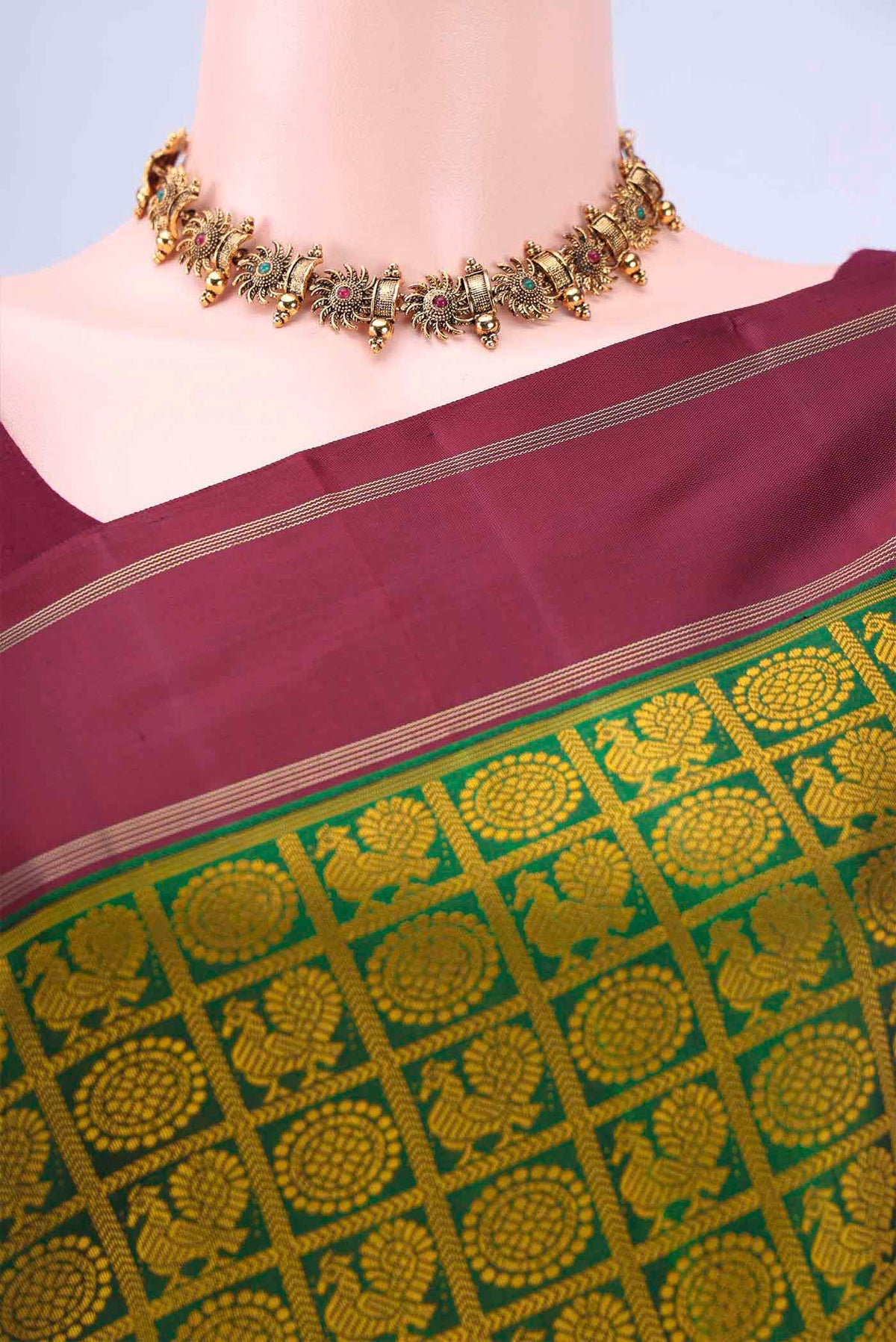 Border image of Bottle Green Kanchipuram Saree with Jacquard design on the body and Thin Zari Line