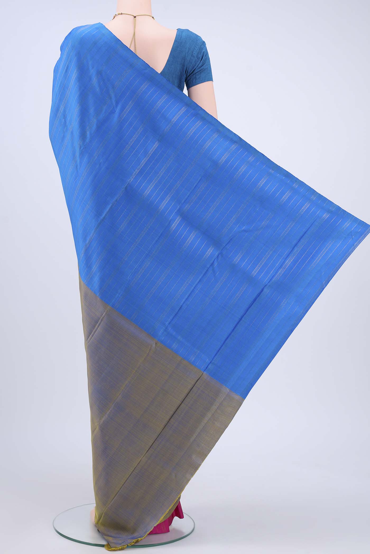 Flat view of Blue Kanchipuram Saree with Zari Butta on the body and Zari Border