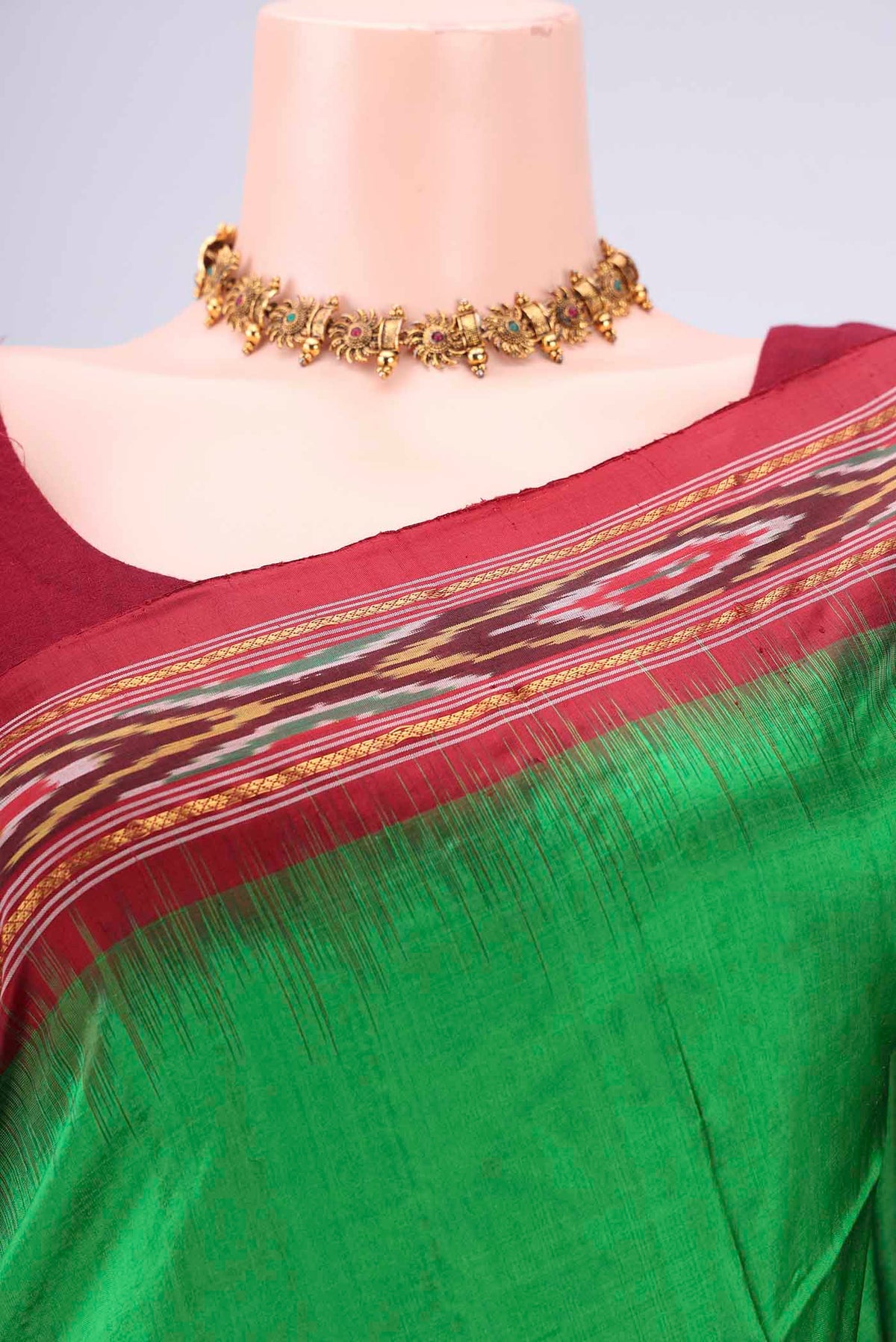 Border image of Green Pochampally Silk Saree with Plain Body and Ikat Border. 