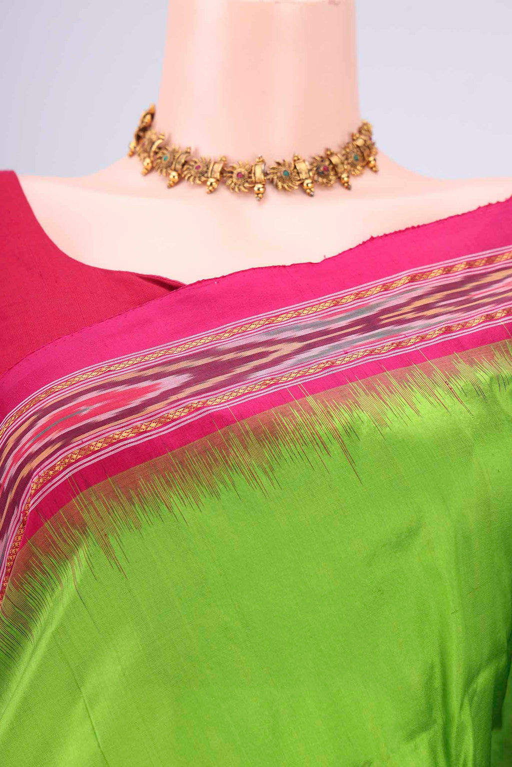 Border image of Parrot Green Pochampally Silk Saree with Plain Body and Ikat Border. 