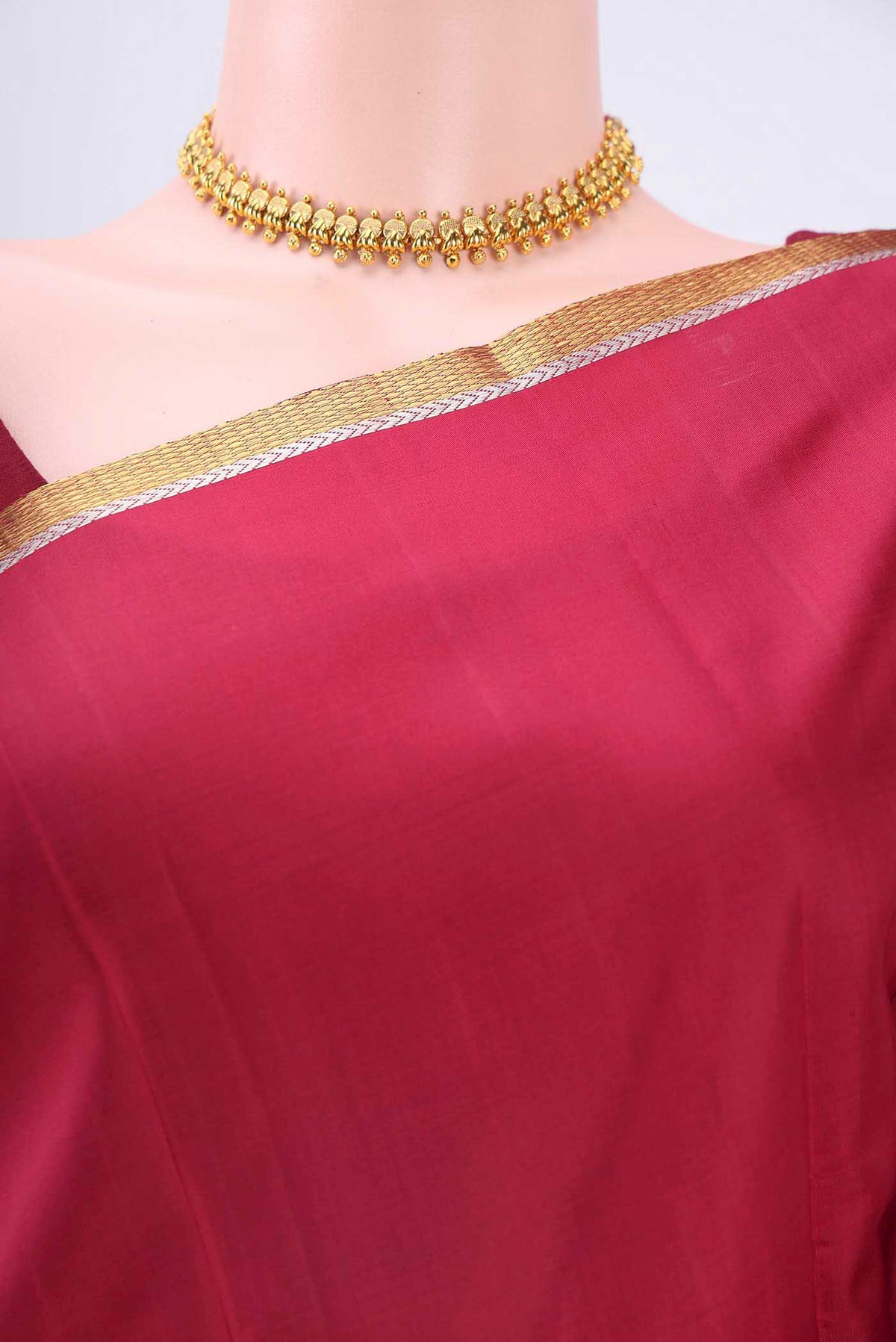 Border image of Maroon Dual Tone Kanchipuram Silk Saree with Plain Body and Zari Border
