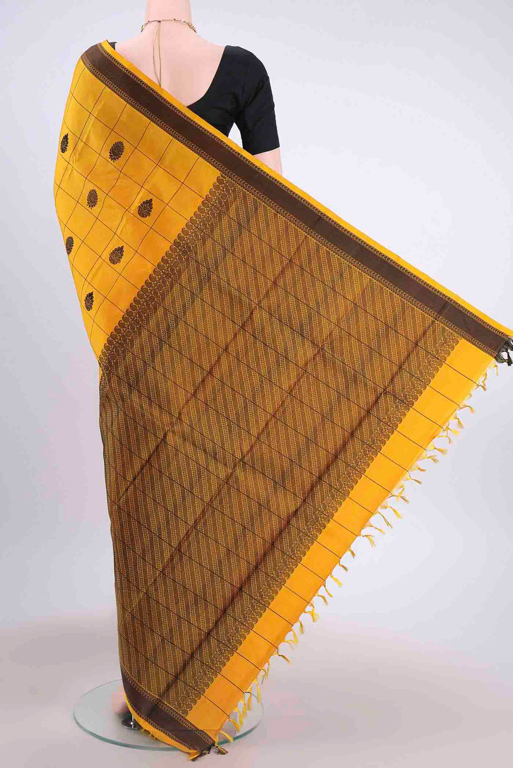 Flat view of Yellow Kanchipuram Silk Saree with Checked design on the body and Thread Border