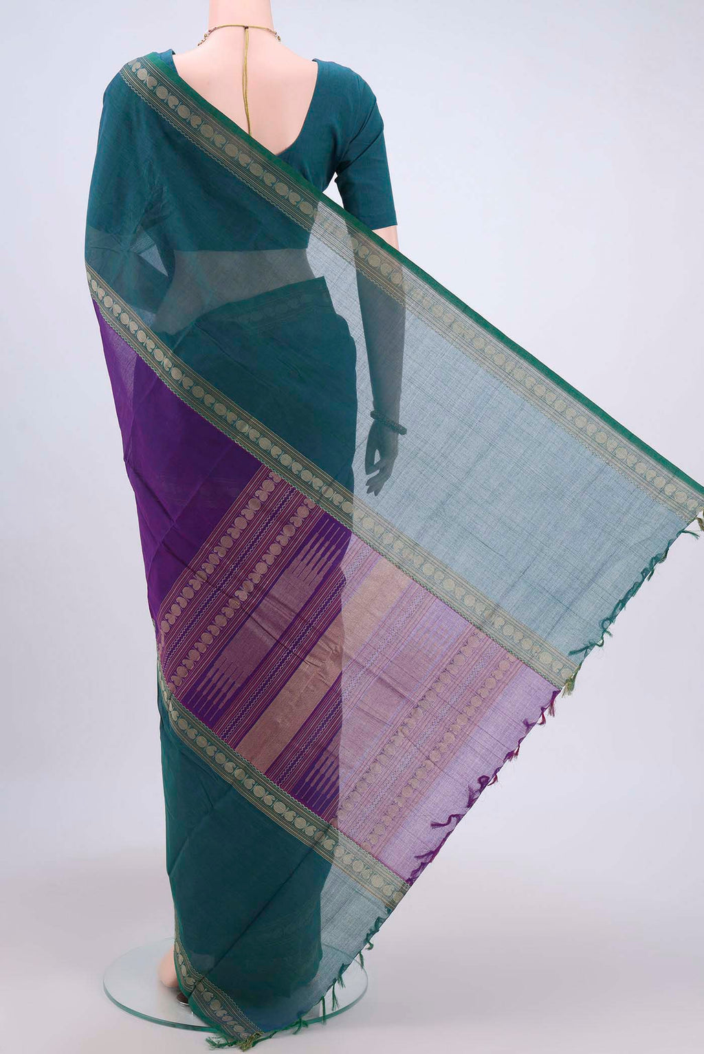 Flat view of Magenta Kanchi Cotton Saree with Plain Body and Zari Border. 