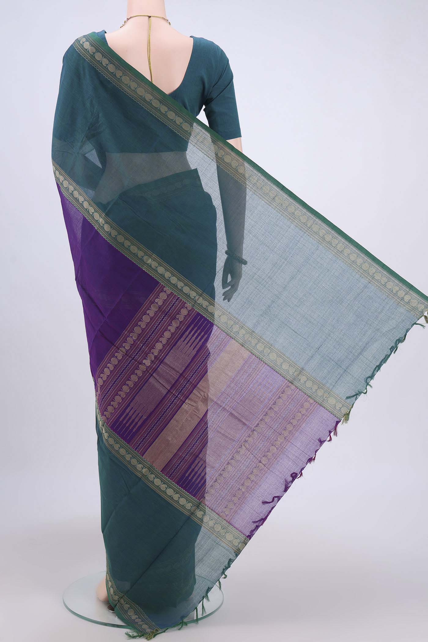 Flat view of Magenta Kanchi Cotton Saree with Plain Body and Zari Border. 