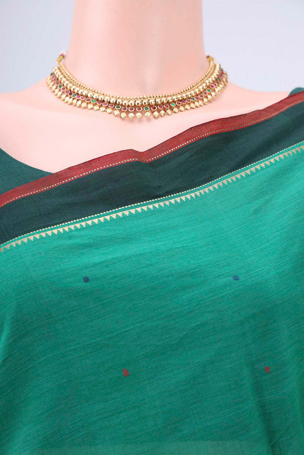Border image of Bottle Green Kanchi Cotton Saree with Thread Butta on the body and Zari Border. 
